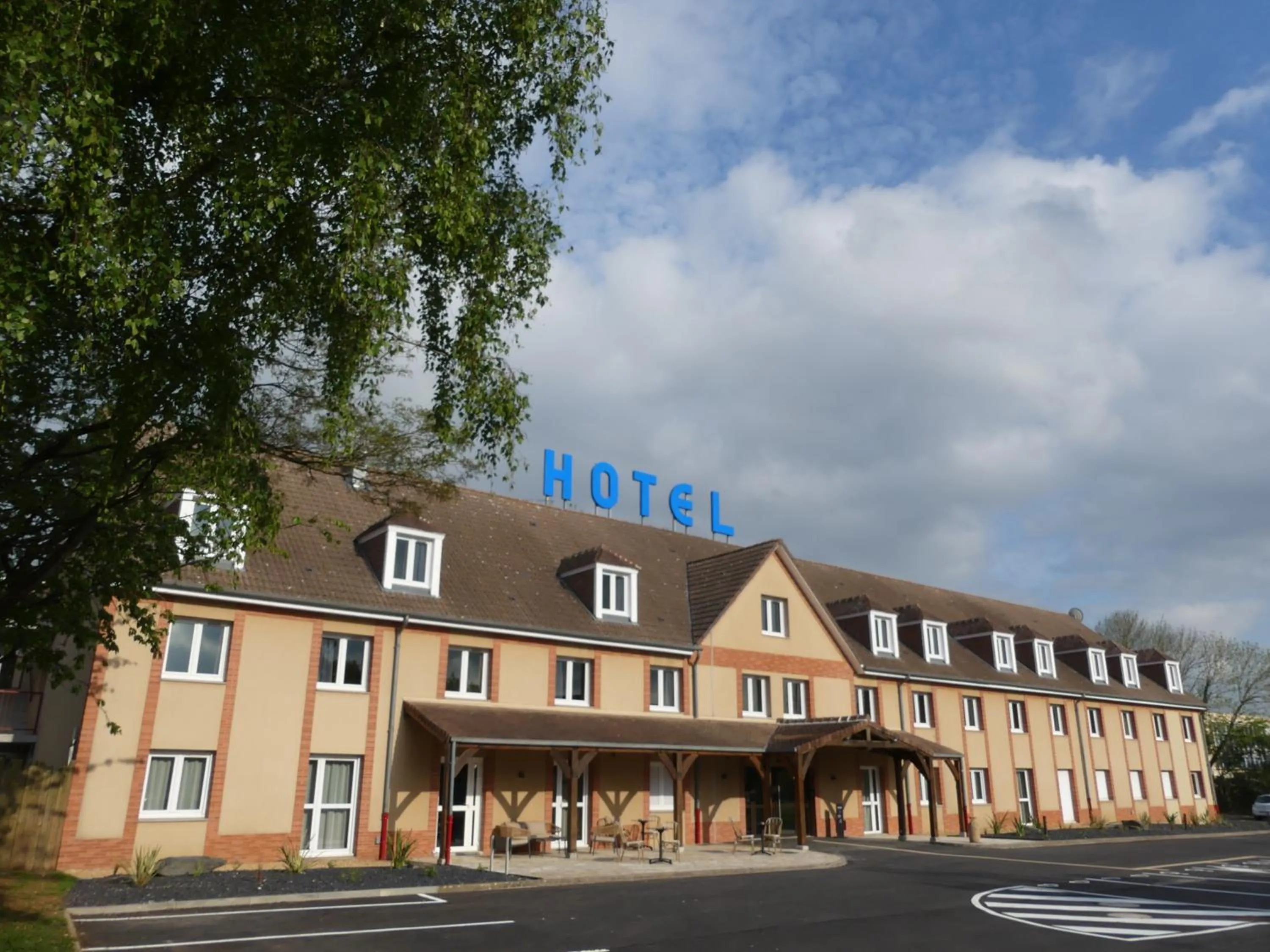 Property building in Brit Hotel Confort Alençon