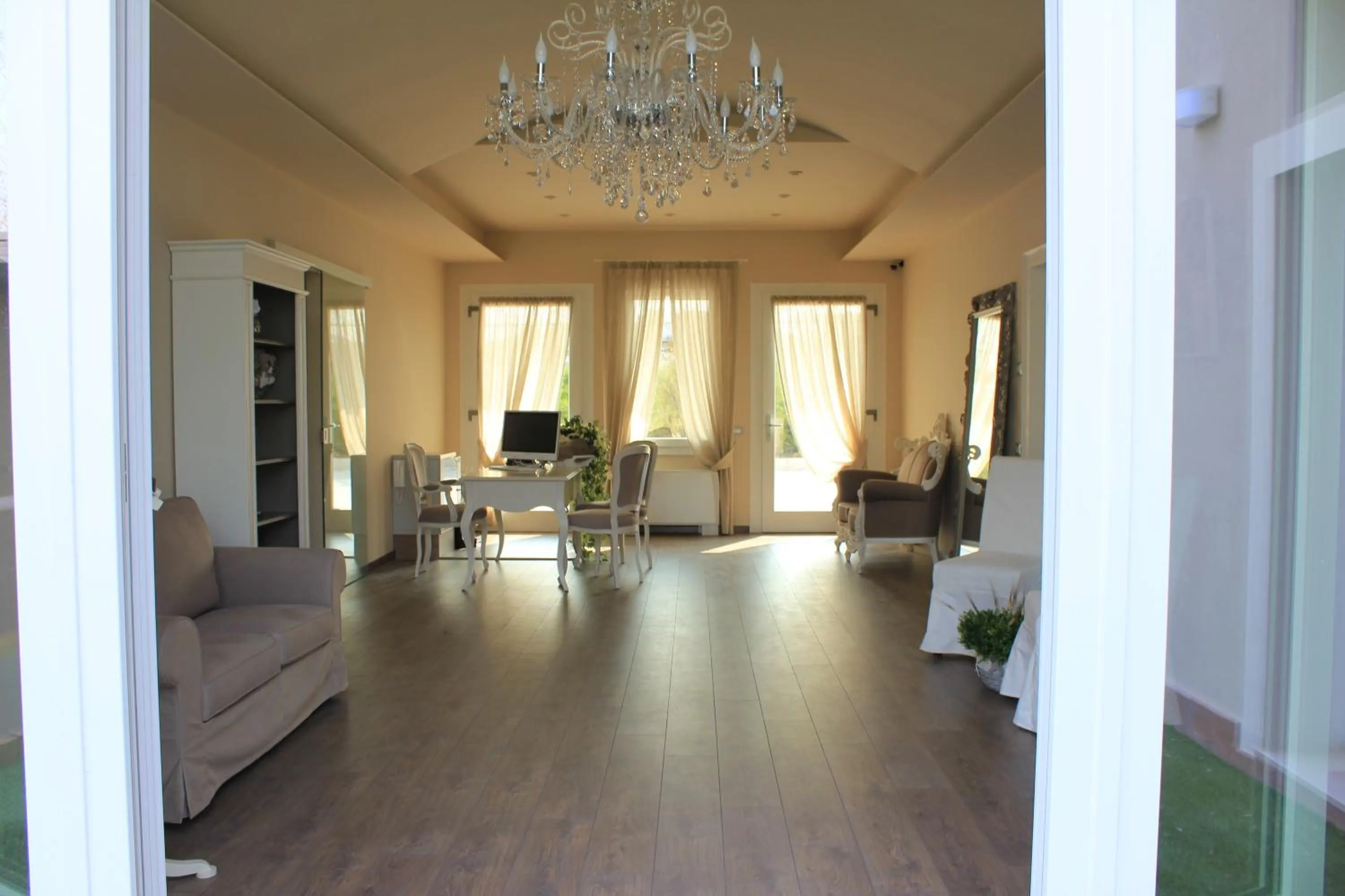 Communal lounge/ TV room in Antica Dimora Stucky