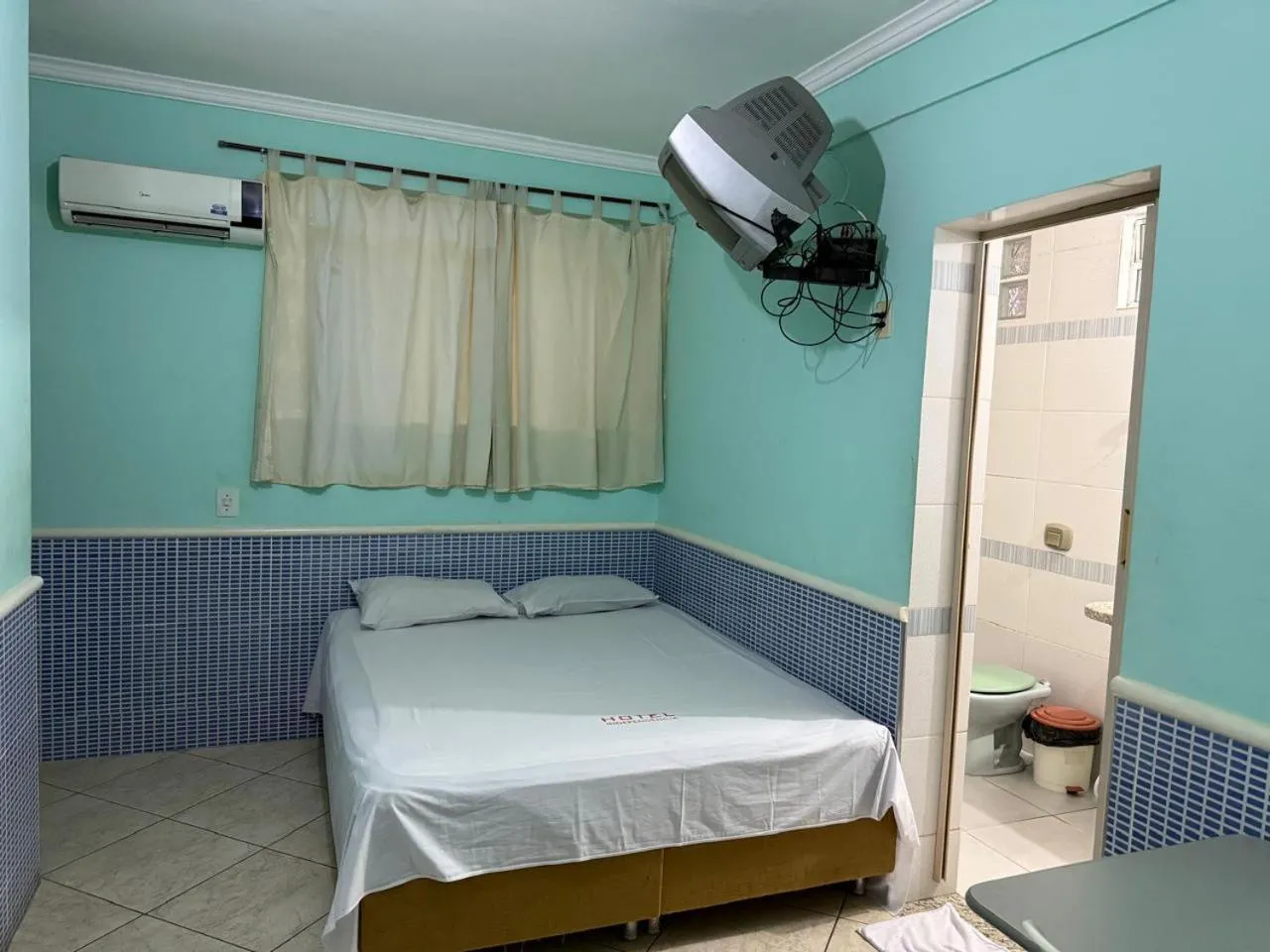 Bed in Hotel Independência