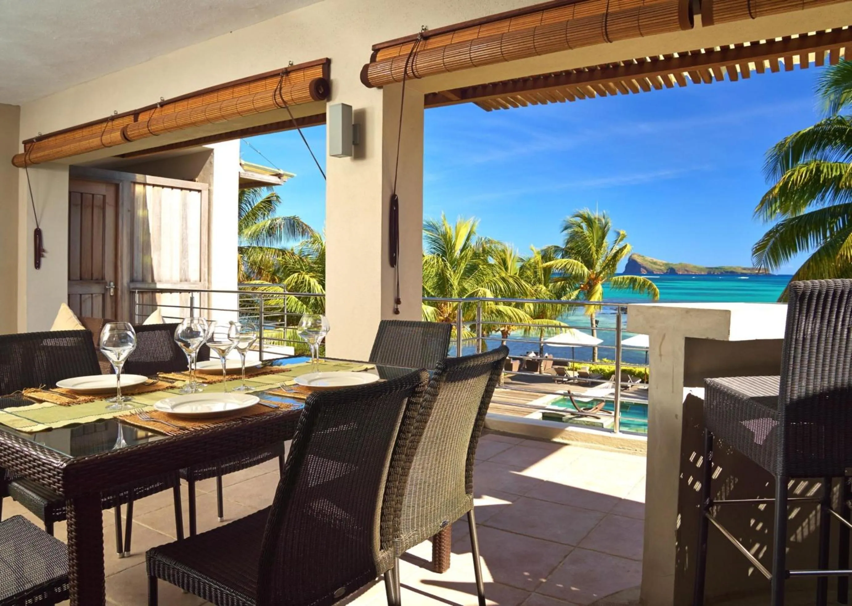 Dining area in Cape Point Seafront by LOV Mauritius