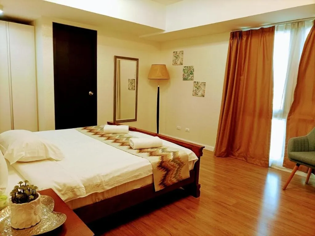 Bedroom, Bed in Davao Central Suites