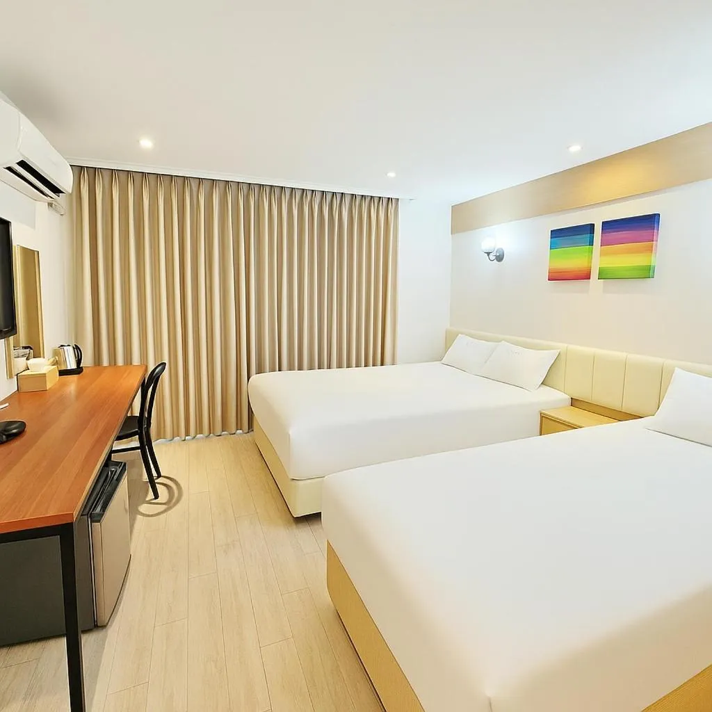 Bed in Tongyeong Bay Condo Hotel