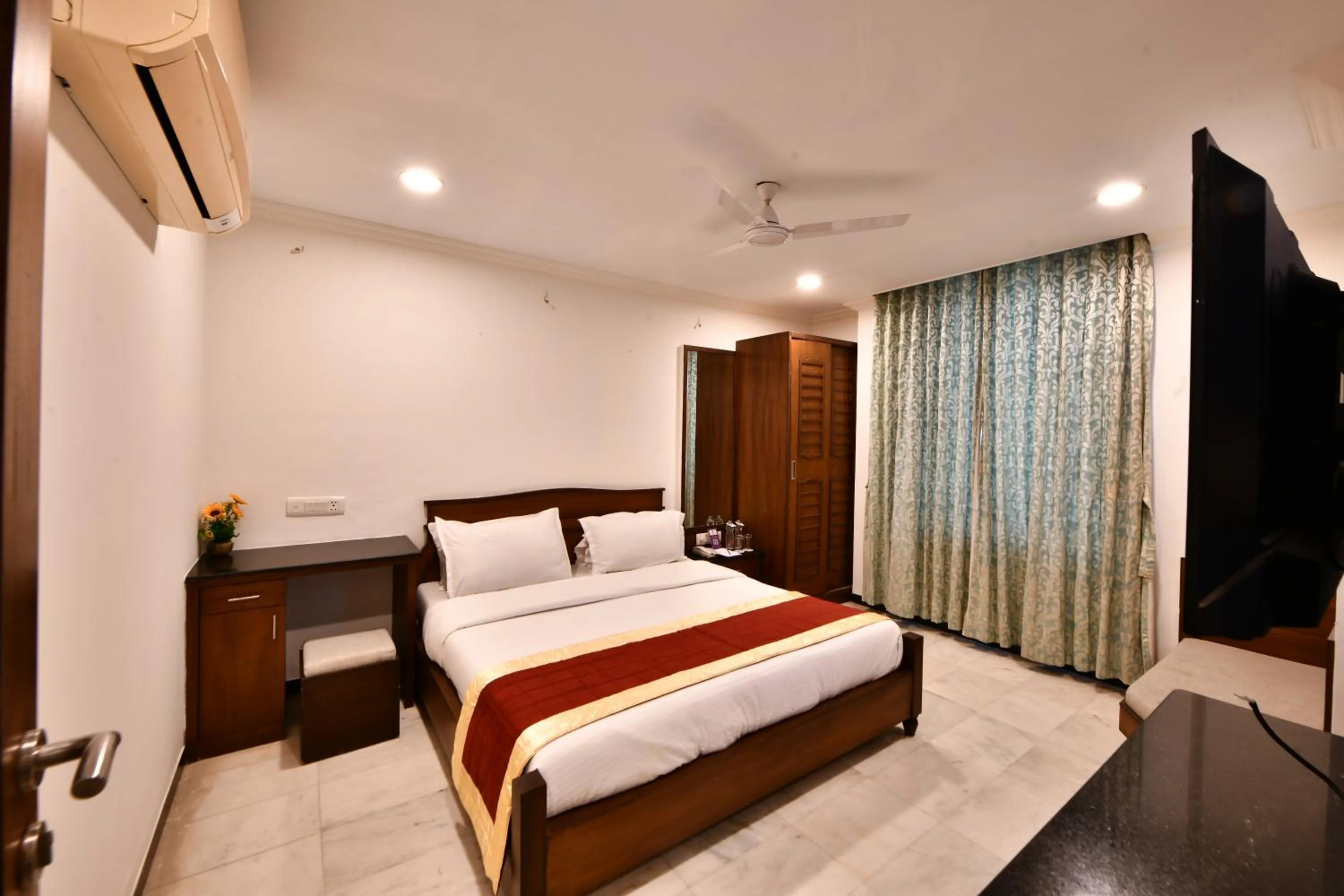 Photo of the whole room, Bed in Click White House Residency, Vadodara