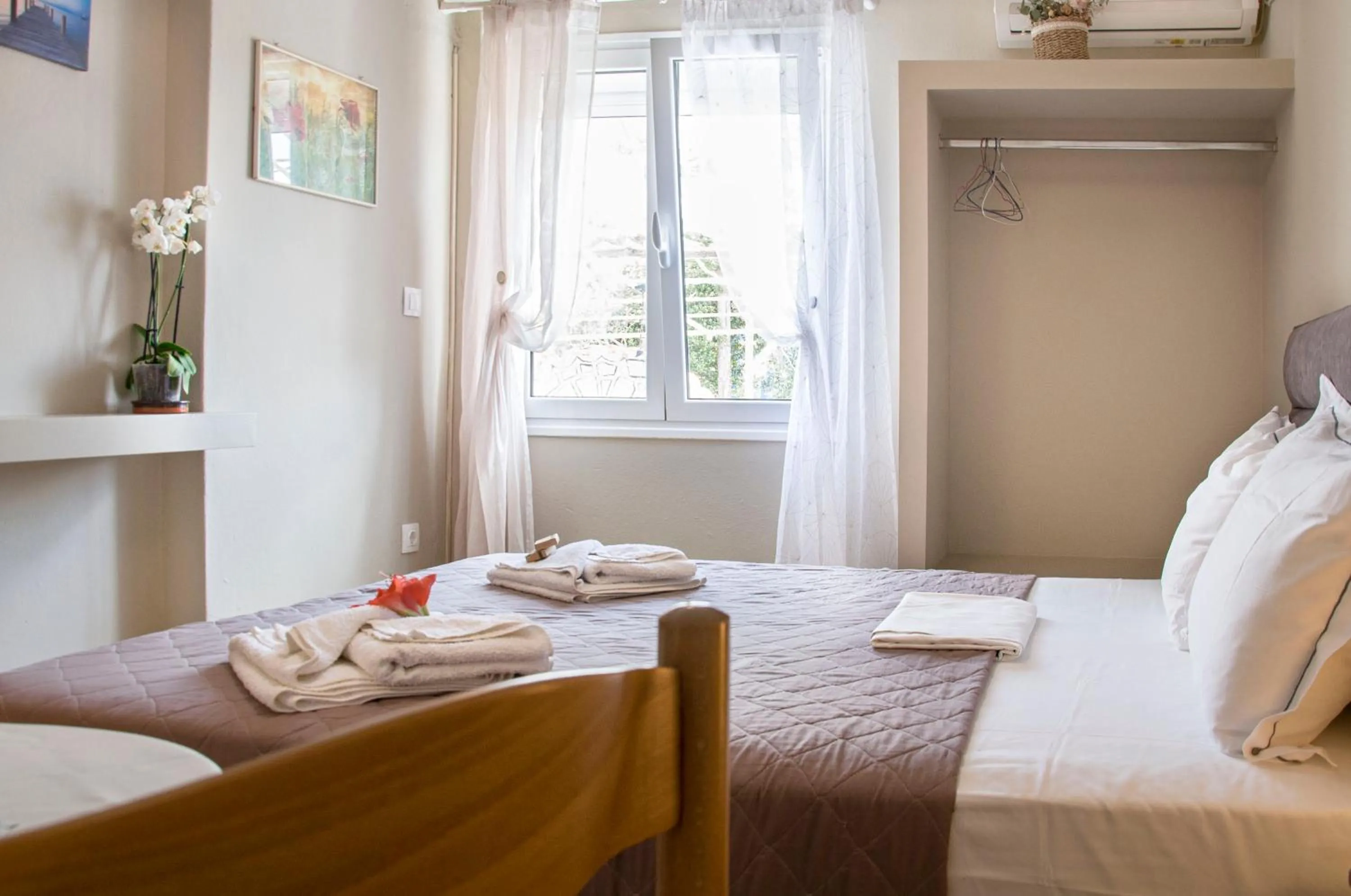 Photo of the whole room, Bed in Christina Rooms