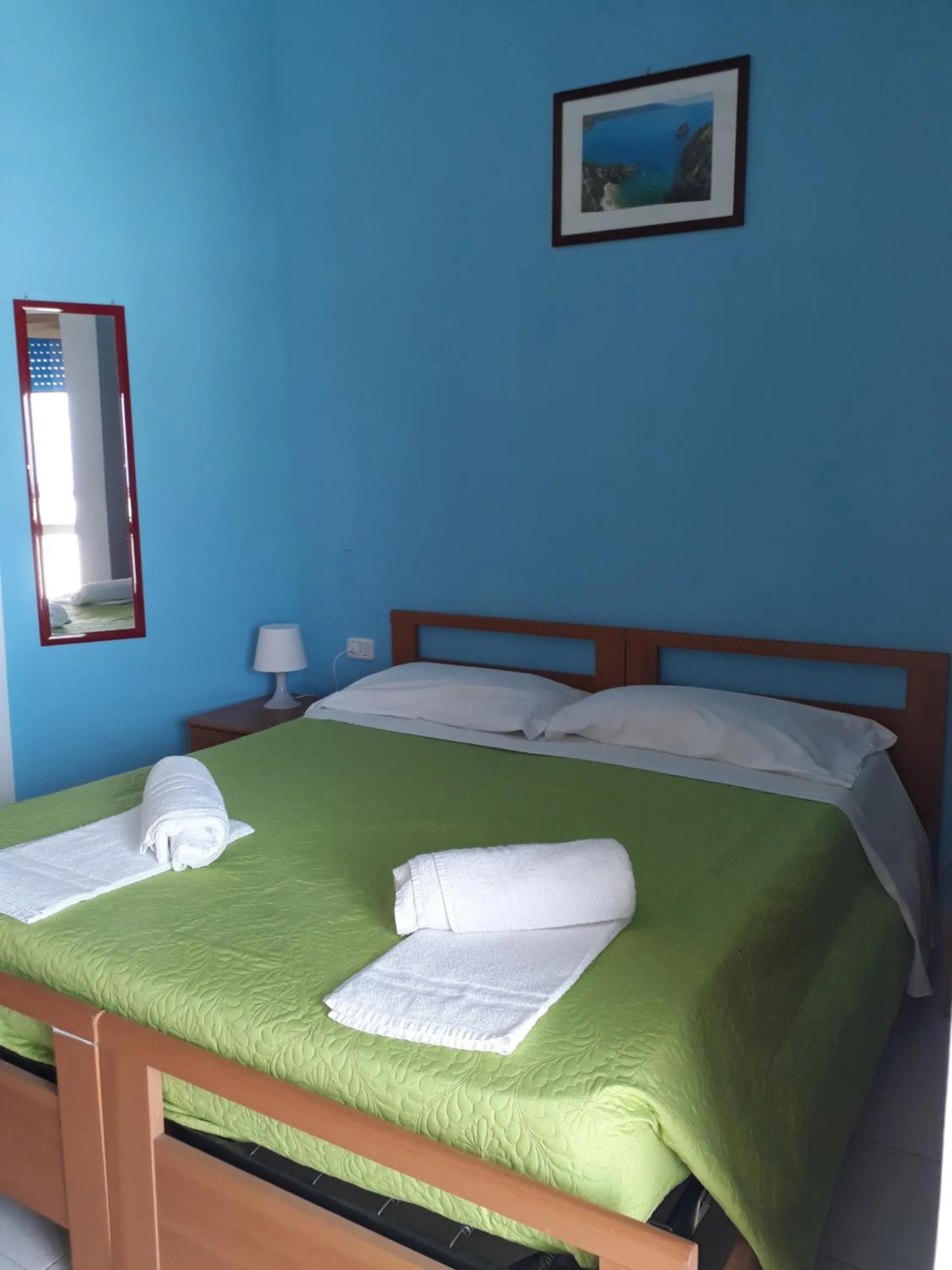 Bed in Pensione Nettuno