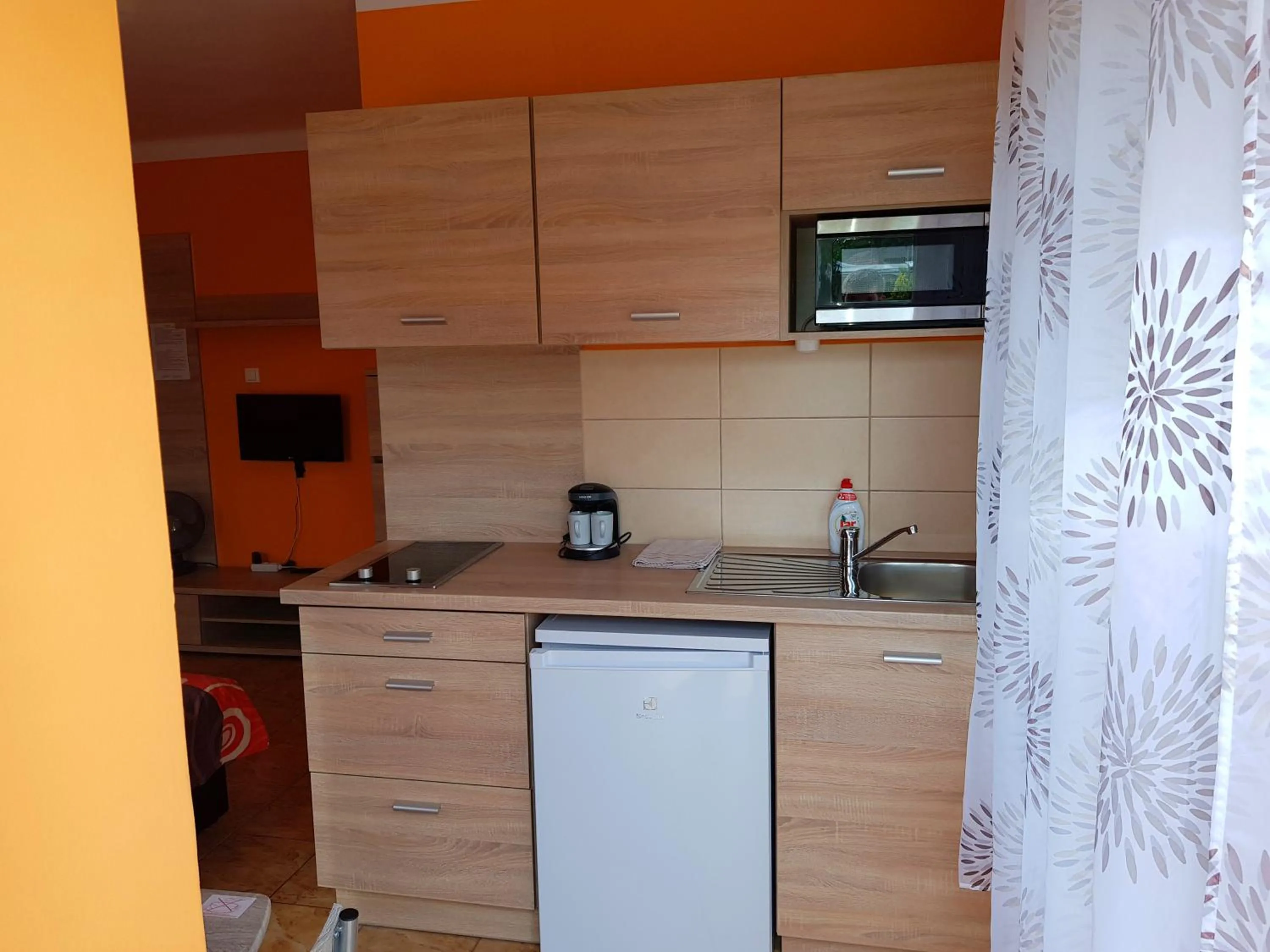 Kitchen or kitchenette in Napsugár Villa "A"