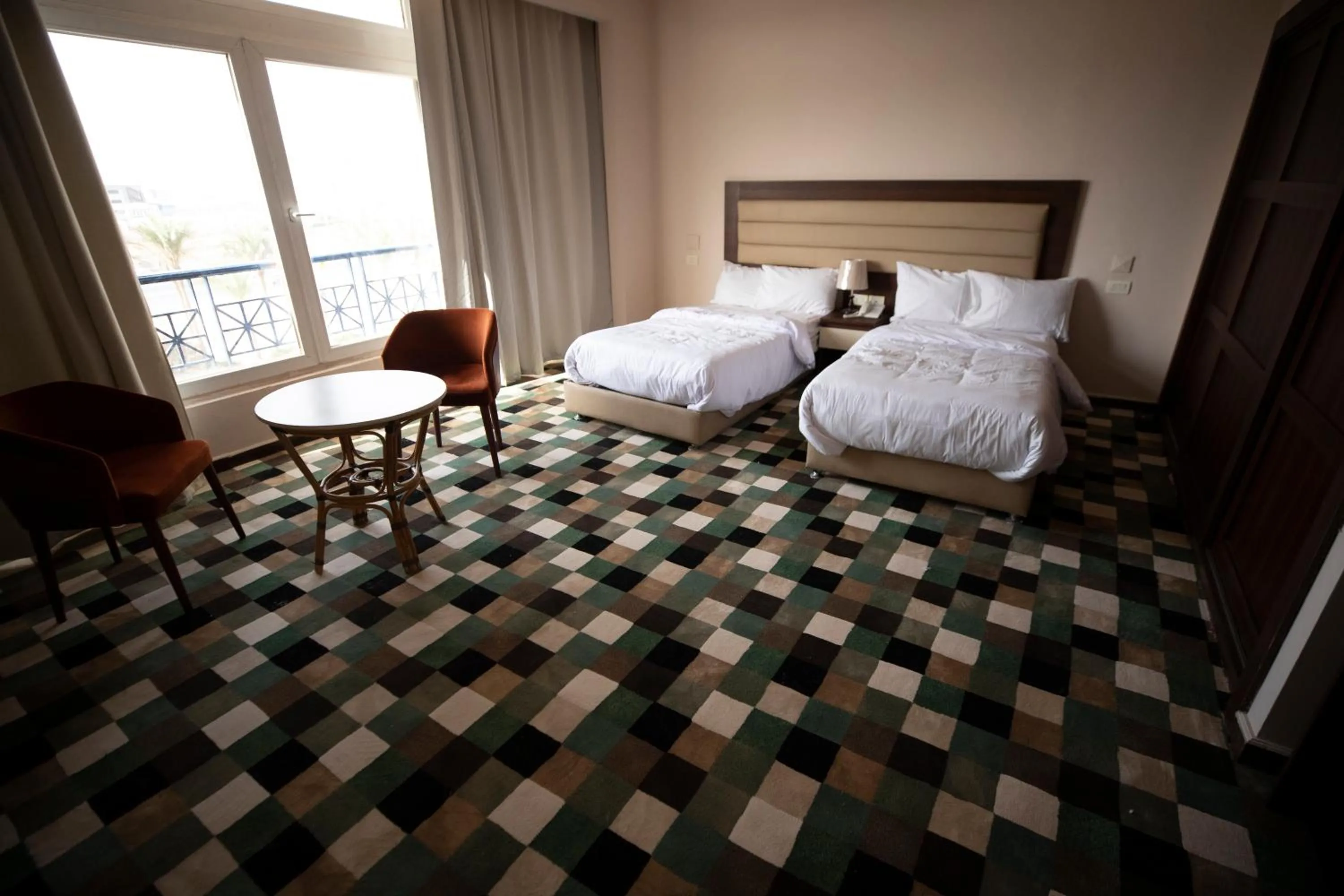 Photo of the whole room, Bed in Oriental grand Plaza