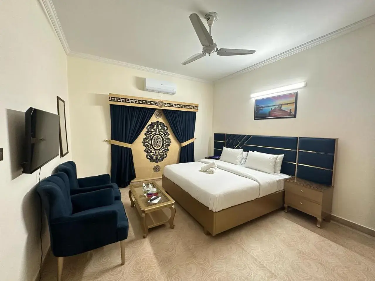 Deluxe Double Room (2 Adults + 1 Child) in Travis Executive Guest House Islamabad Deluxe Double Room (2 Adults + 1 Child) in Travis Executive Guest House Islamabad