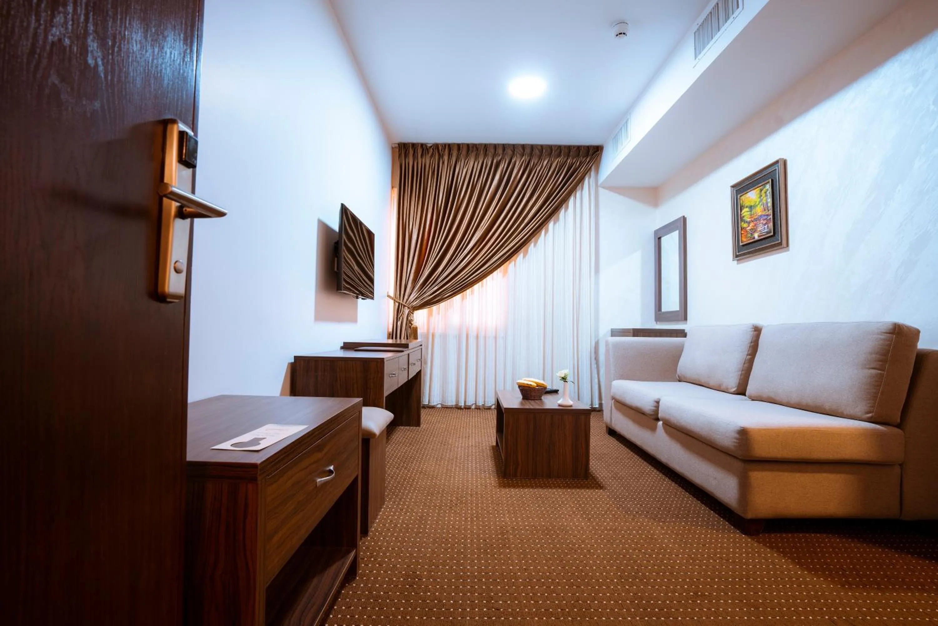 Living room, Bed in Rawa Luxury Hotel Suites