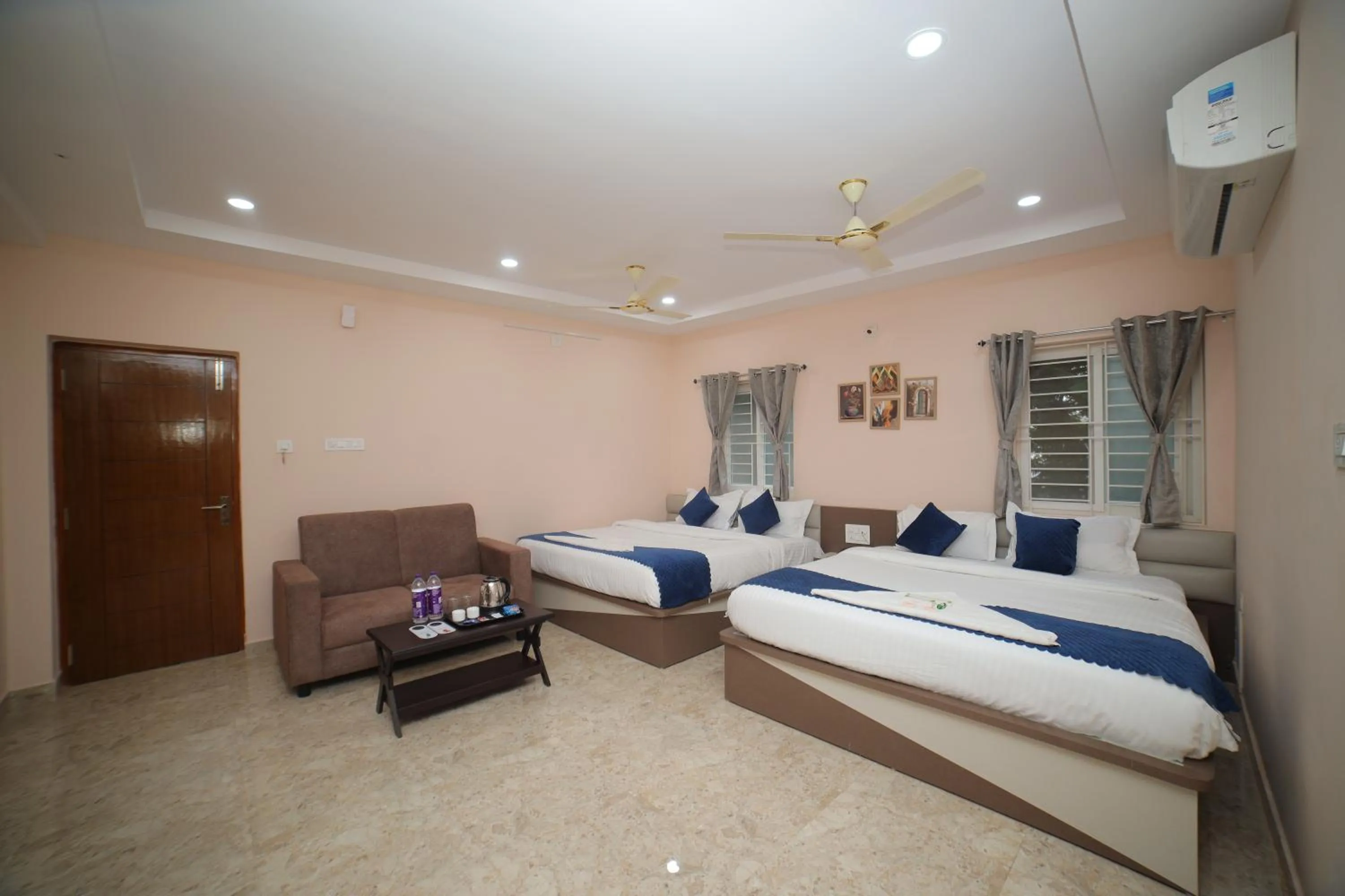 Photo of the whole room, Bed in Sri Ganesh Grand