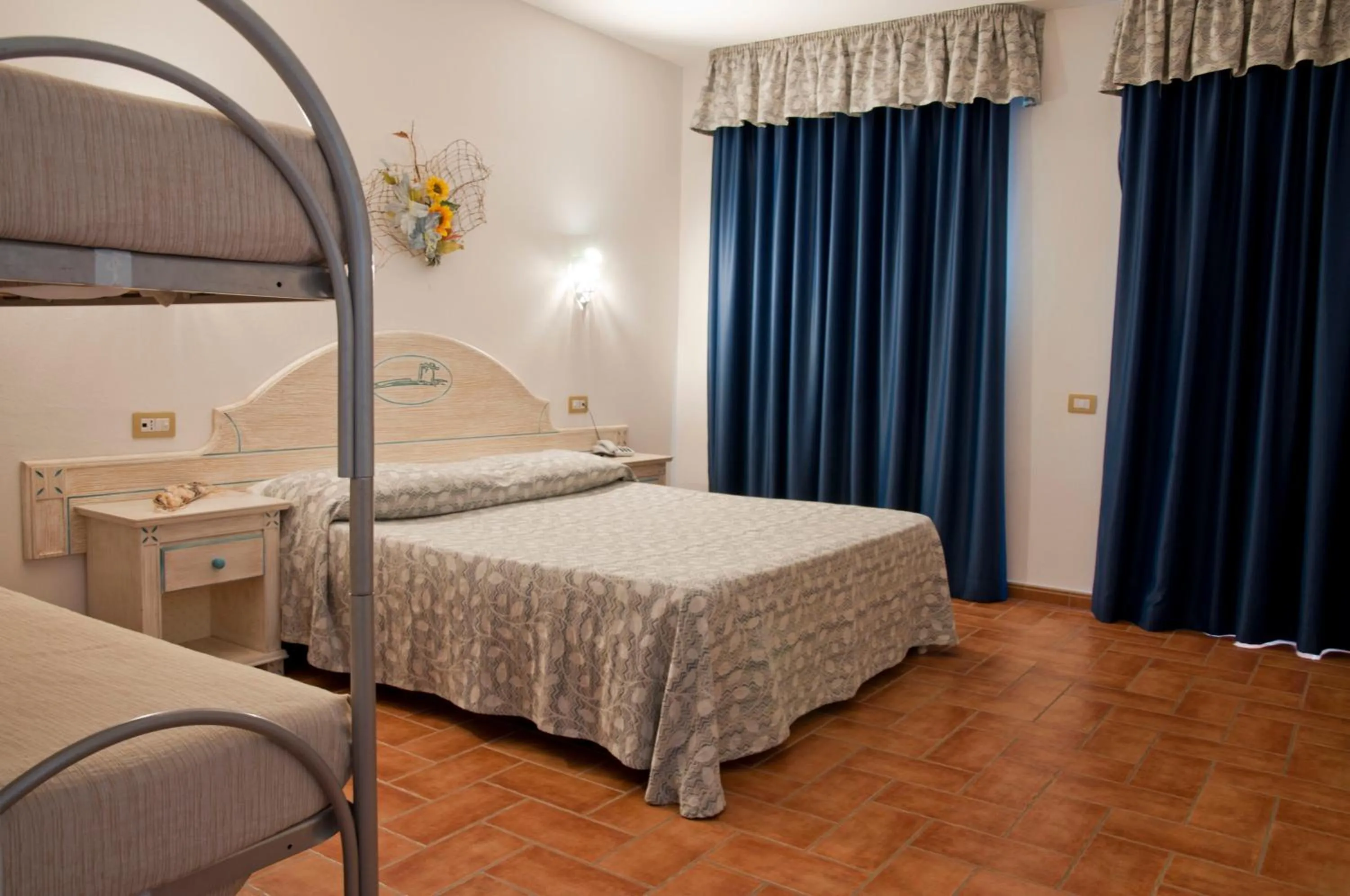 Bed in Hotel le Sabbie