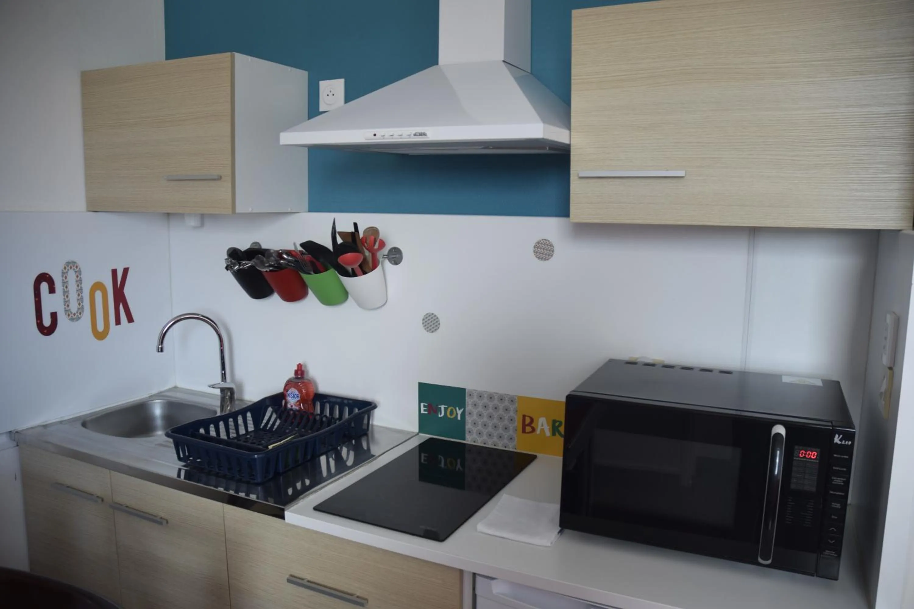 Kitchen or kitchenette in Appart-alma
