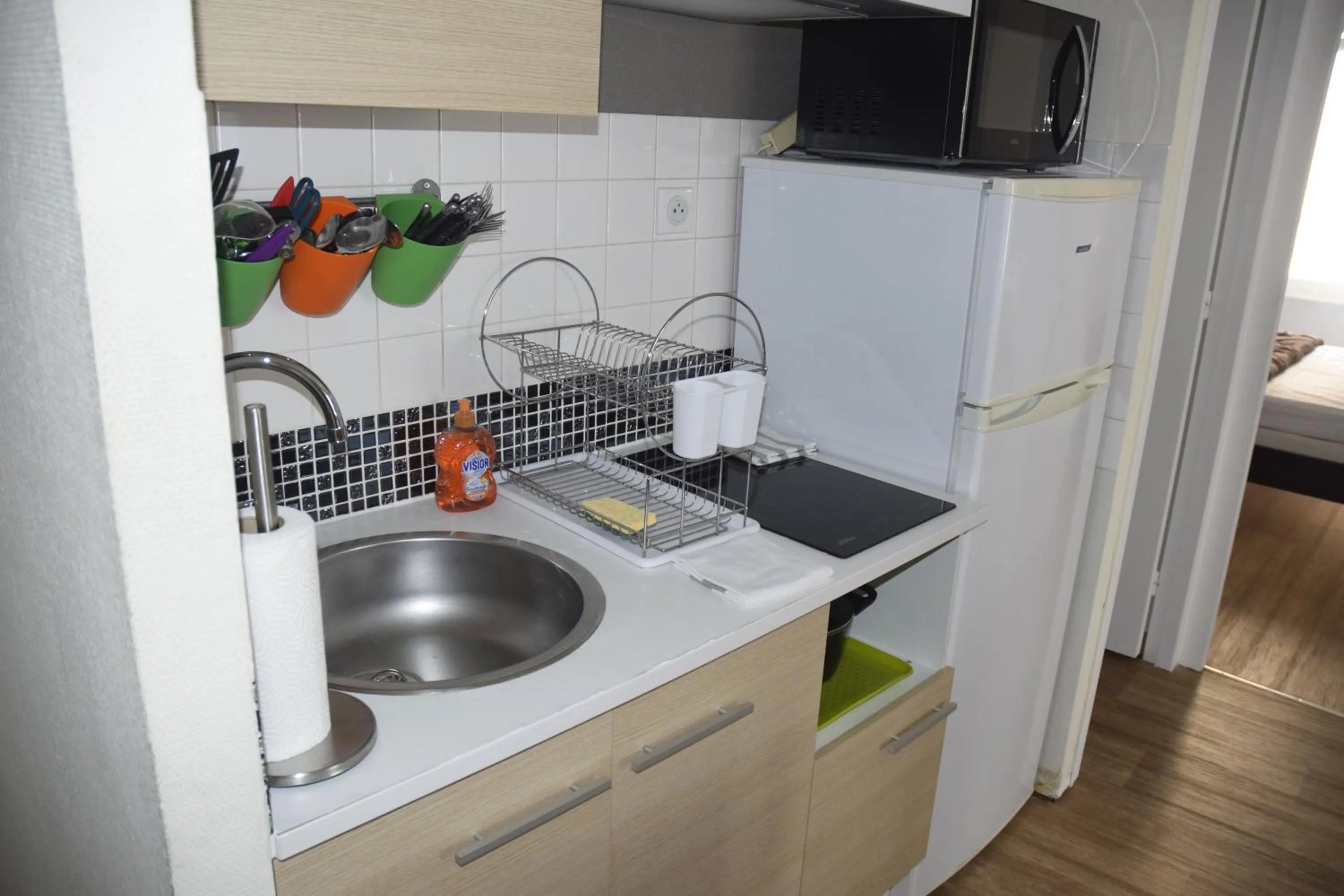 Kitchen or kitchenette in Appart-alma