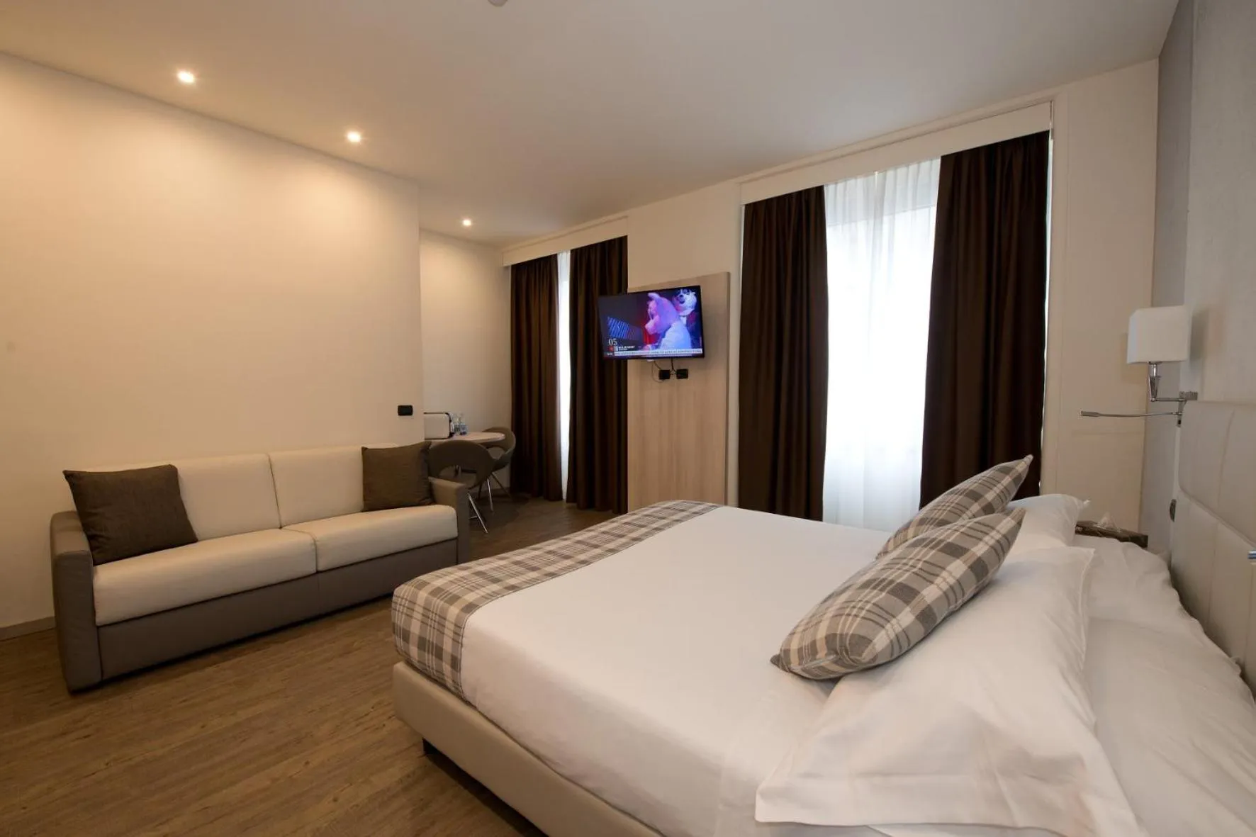 Photo of the whole room, Bed in Duomo Hotel & Apartments