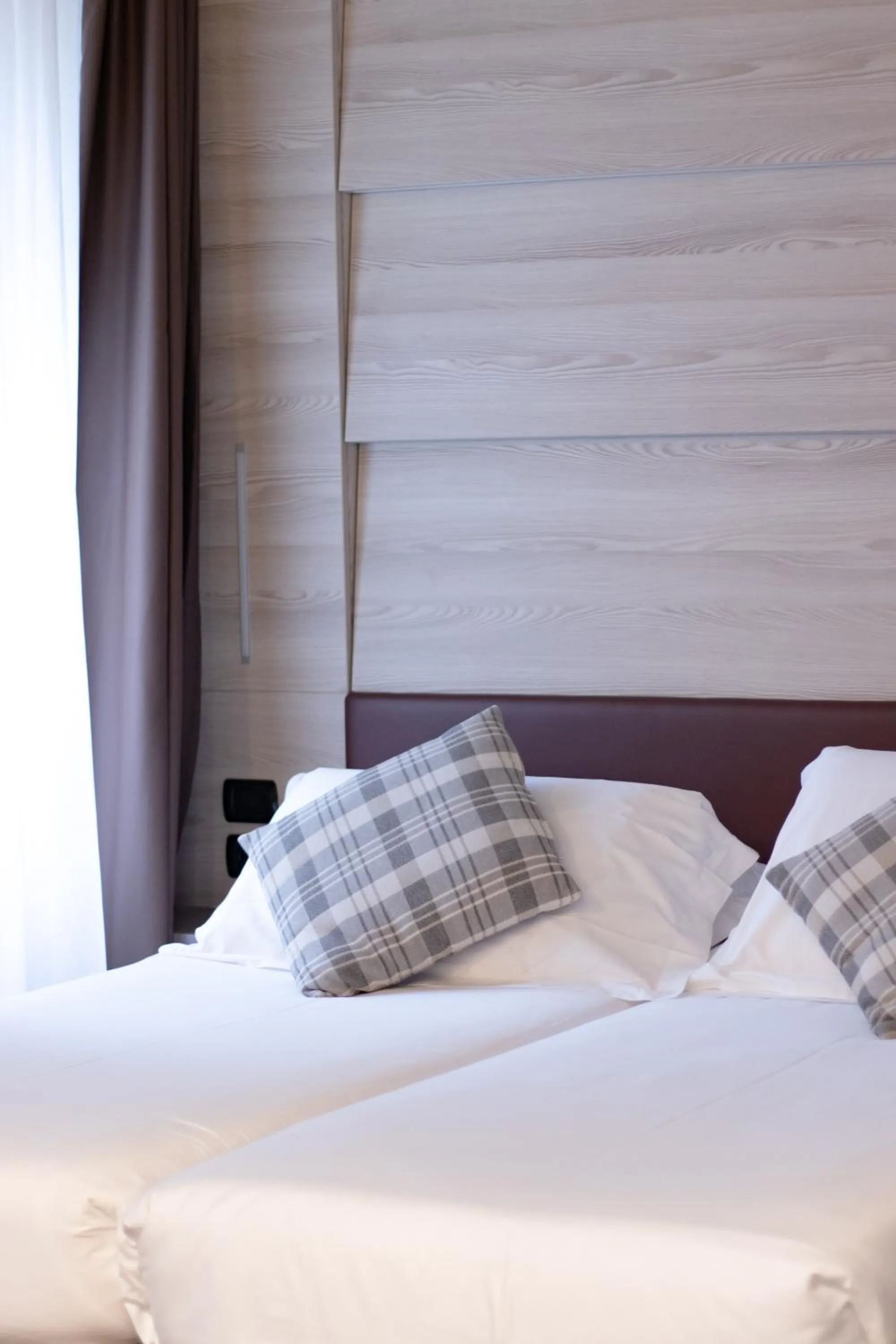 Bed in Duomo Hotel & Apartments