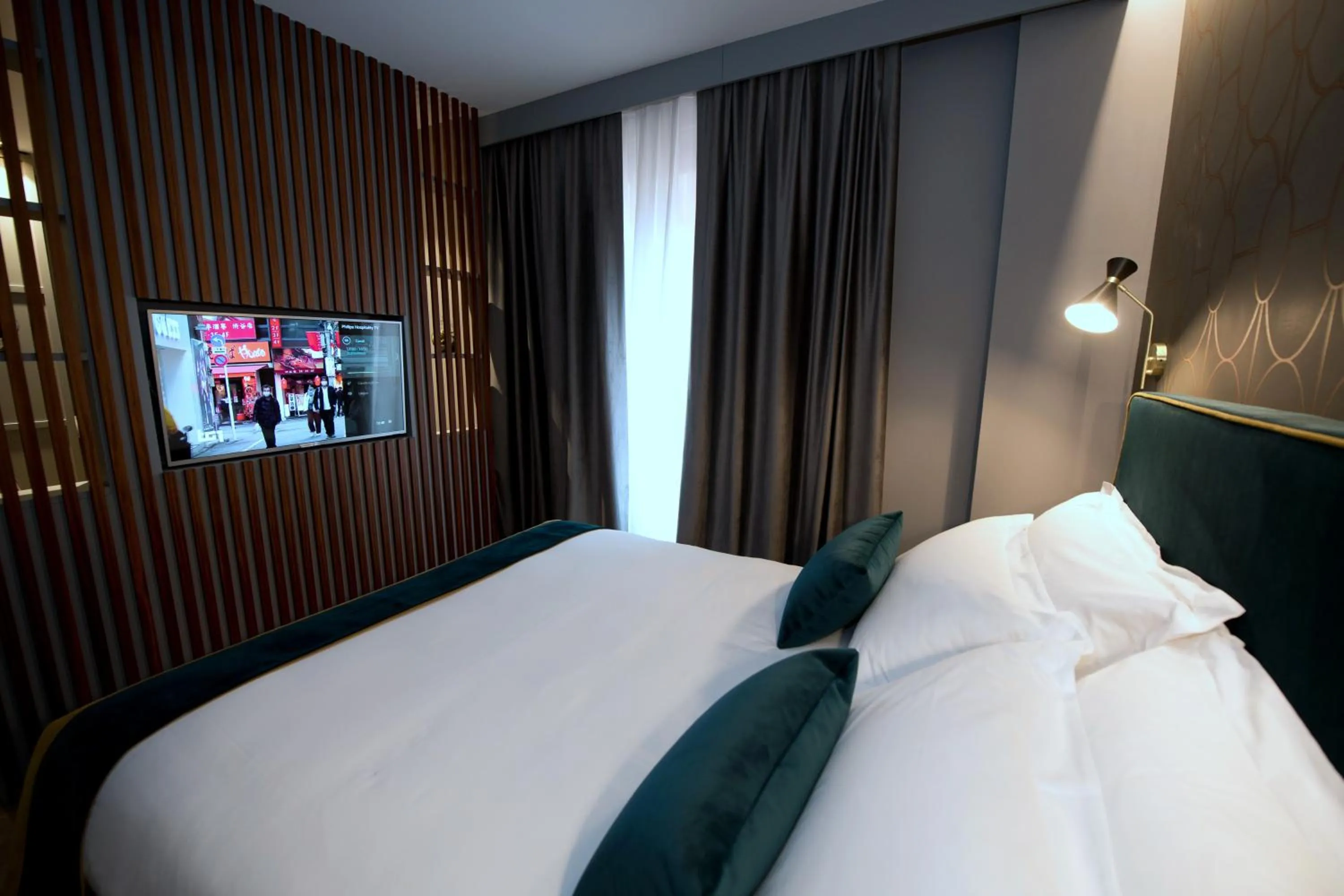 Bed in Duomo Hotel & Apartments