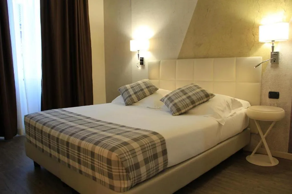 Bed in Duomo Hotel & Apartments