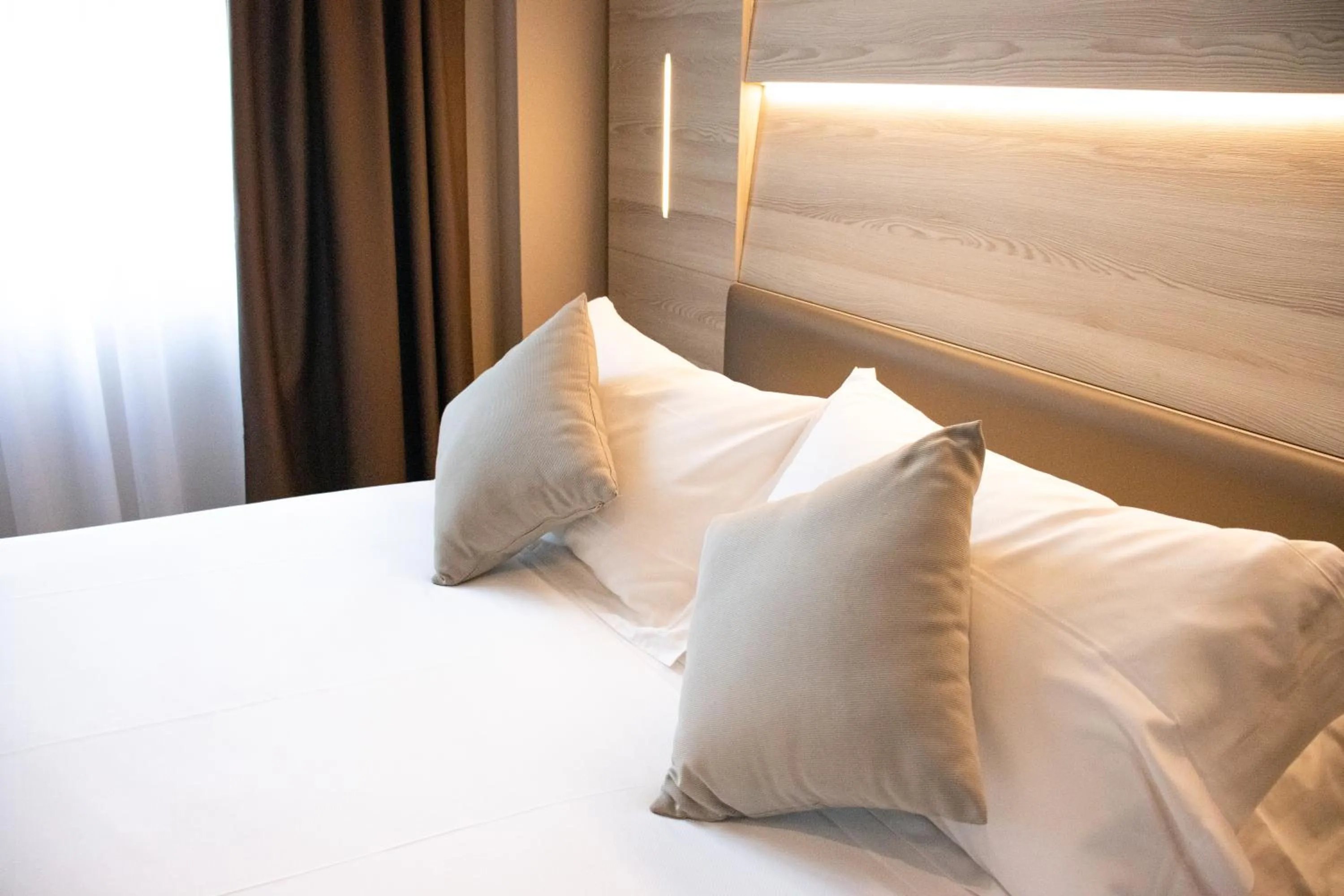 Bed in Duomo Hotel & Apartments