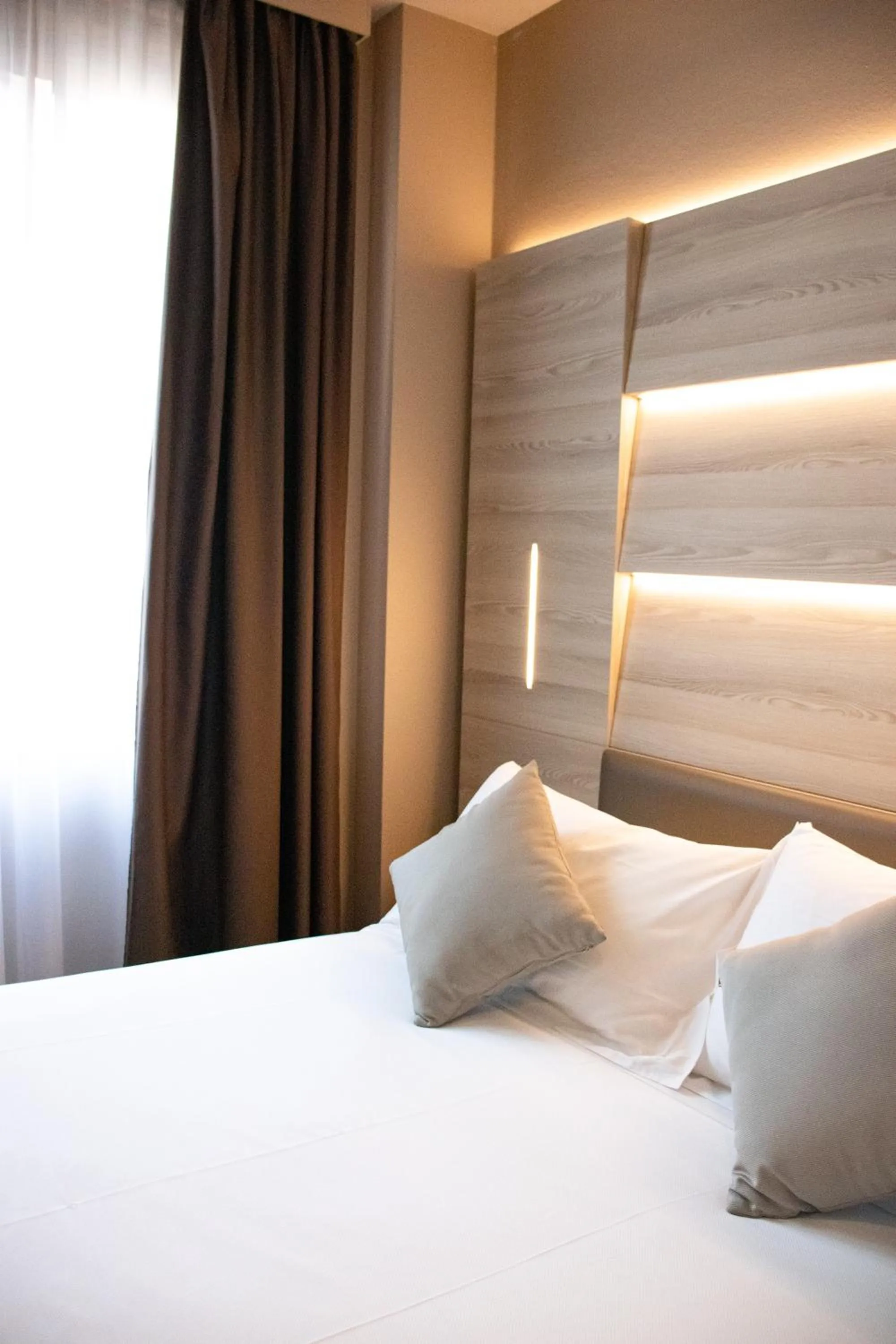 Bed in Duomo Hotel & Apartments