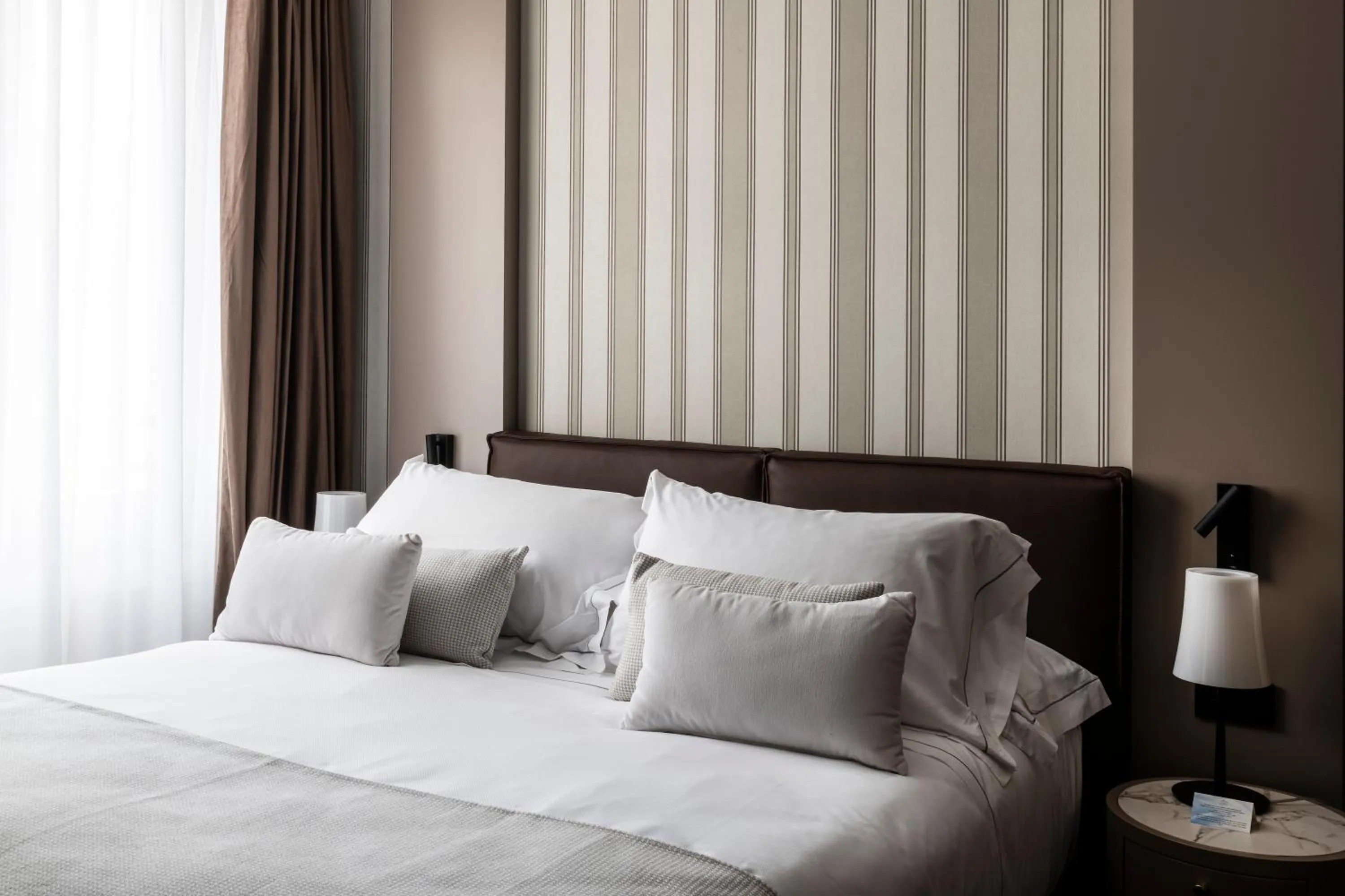 Bed in Duomo Hotel & Apartments