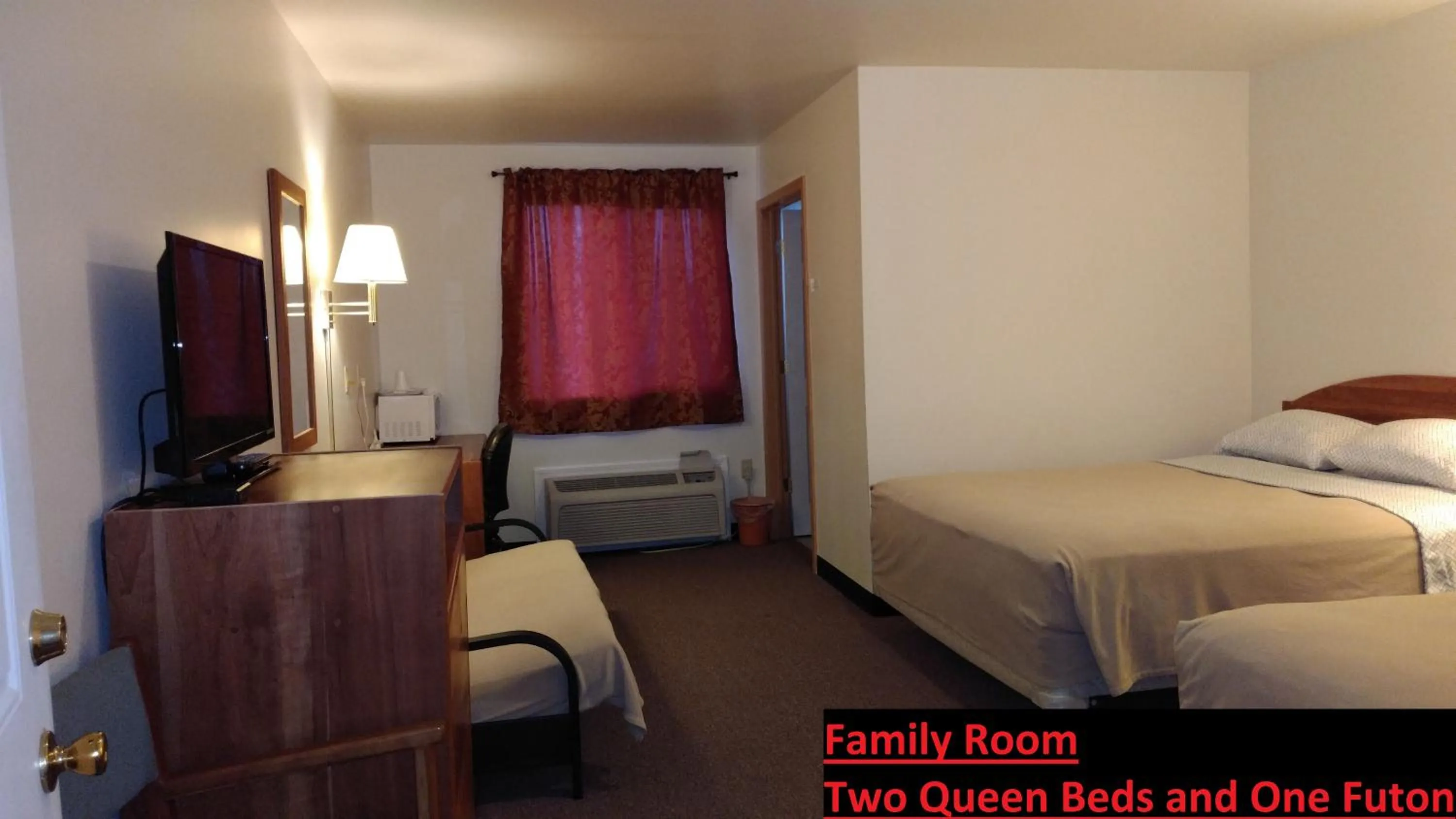 Bed in Stay Inn and Suites