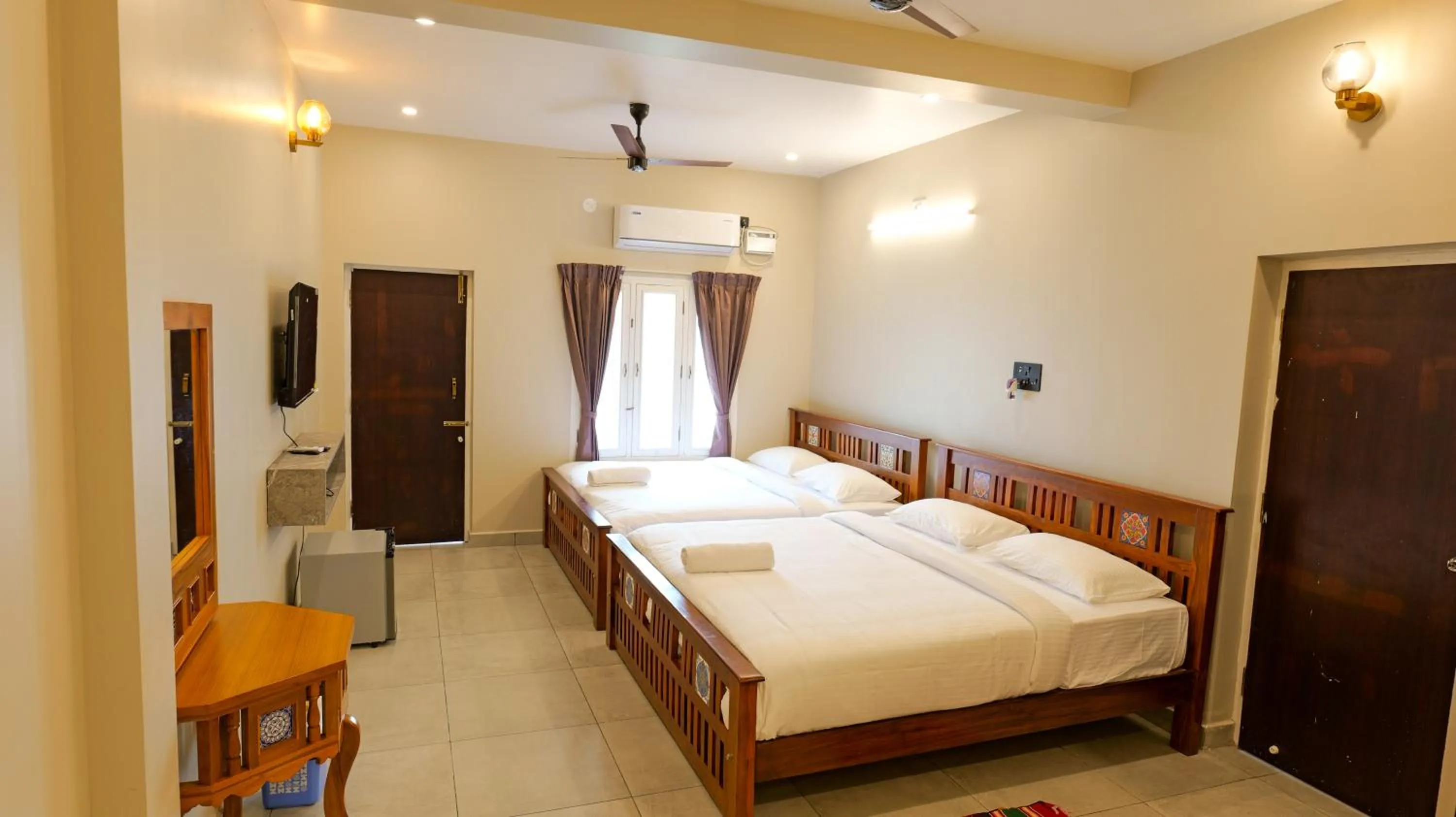 Photo of the whole room, Bed in Dwaraka Resorts