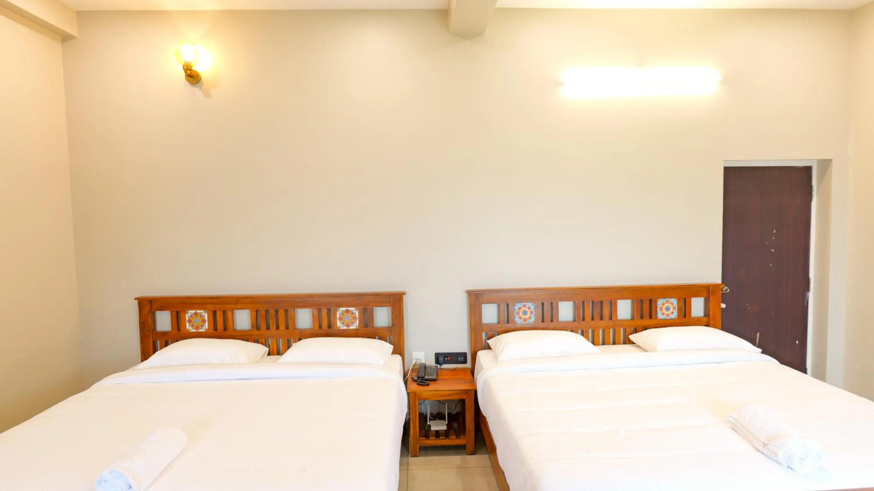 Photo of the whole room, Bed in Dwaraka Resorts