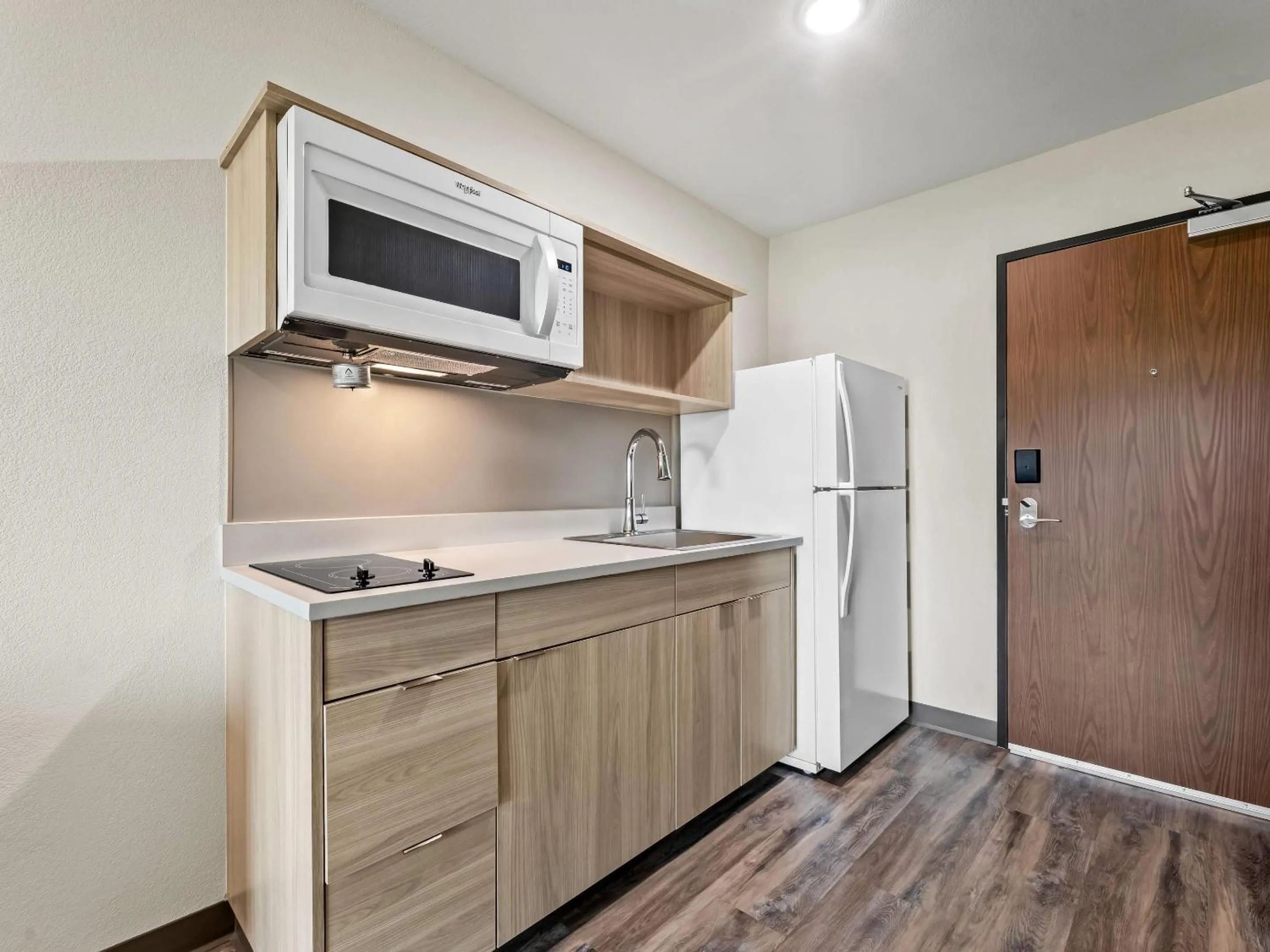 Bedroom in WoodSpring Suites Prattville - Montgomery North