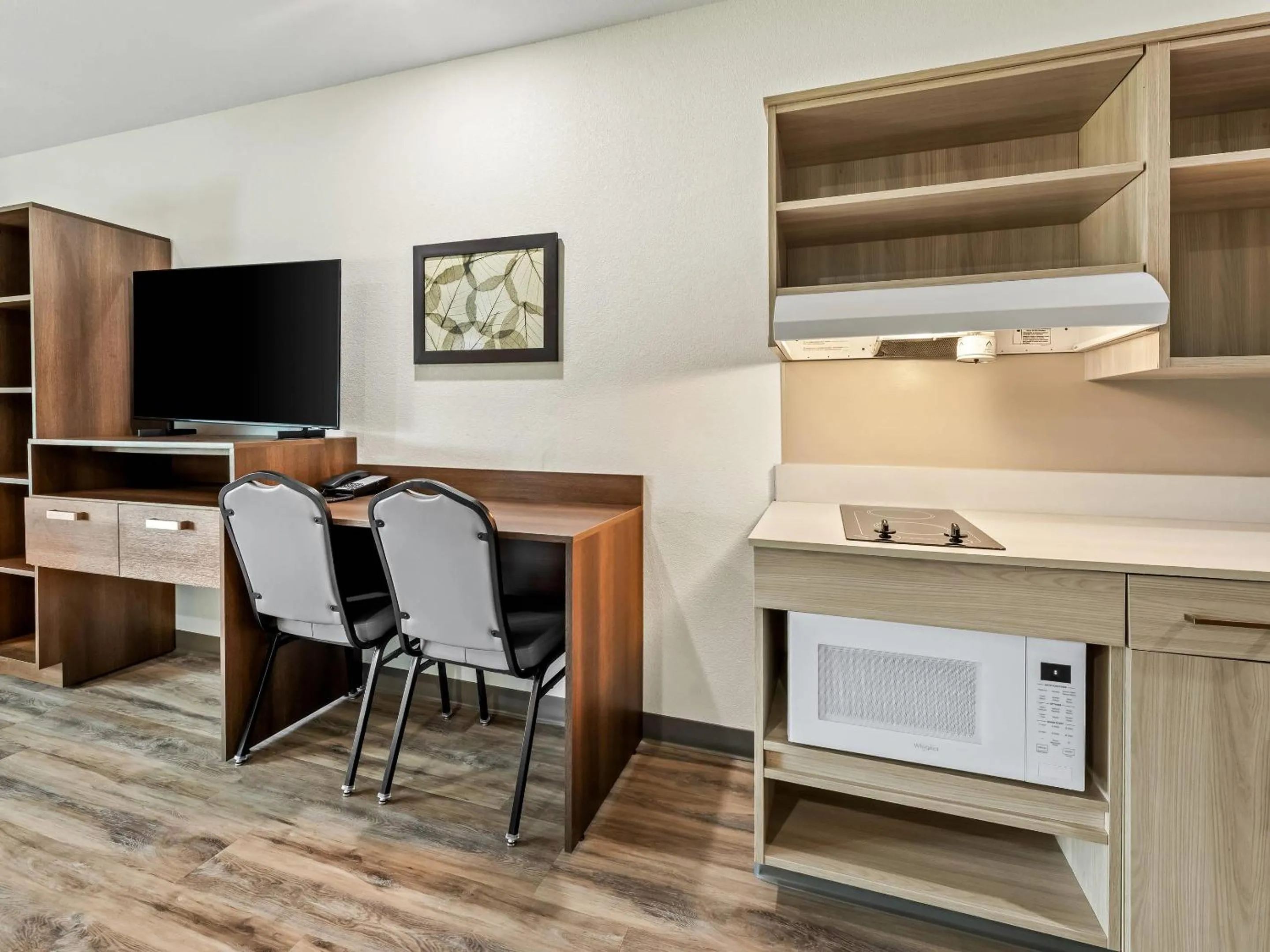 Bedroom in WoodSpring Suites Prattville - Montgomery North