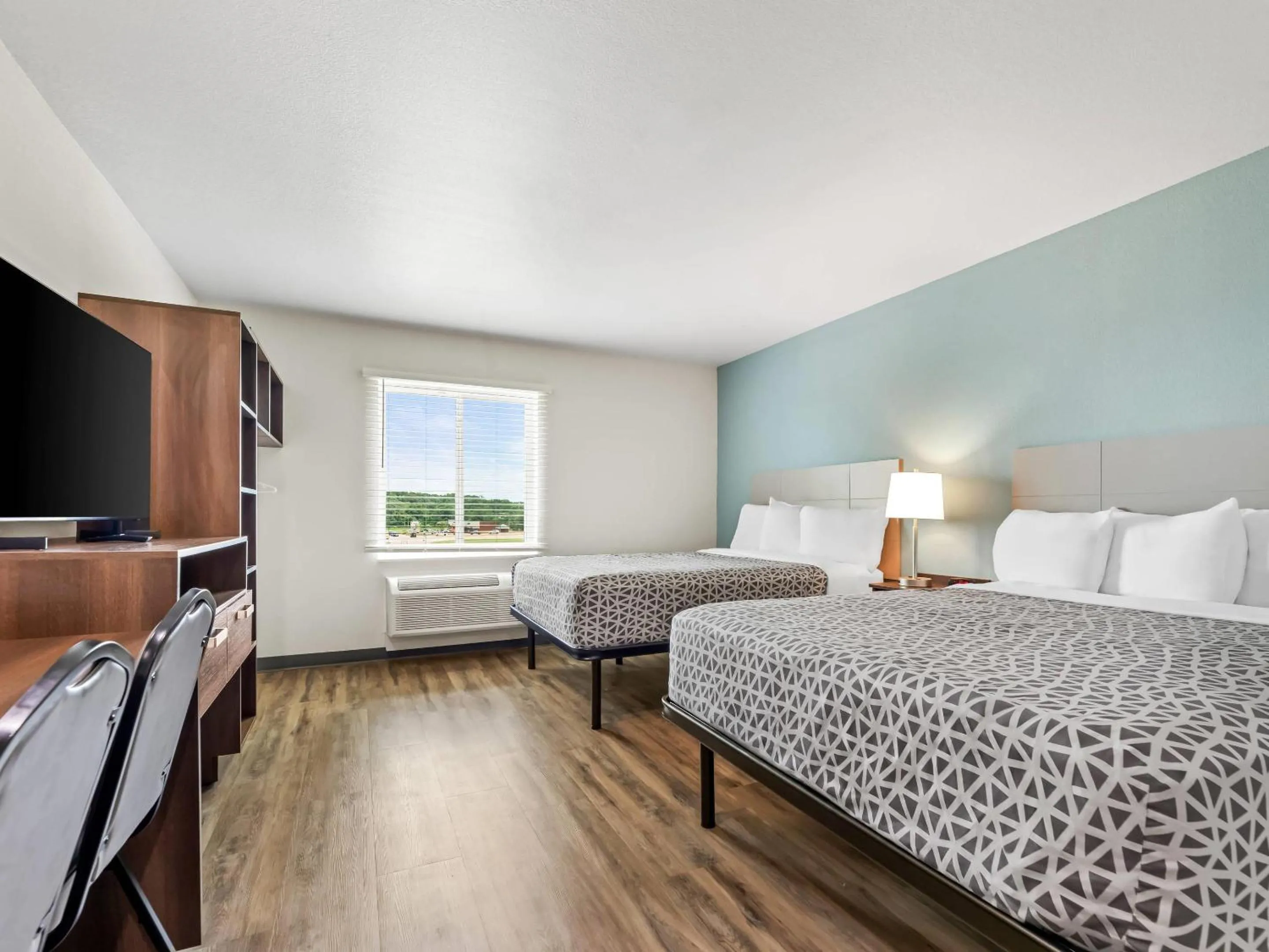 Bedroom, Bed in WoodSpring Suites Prattville - Montgomery North