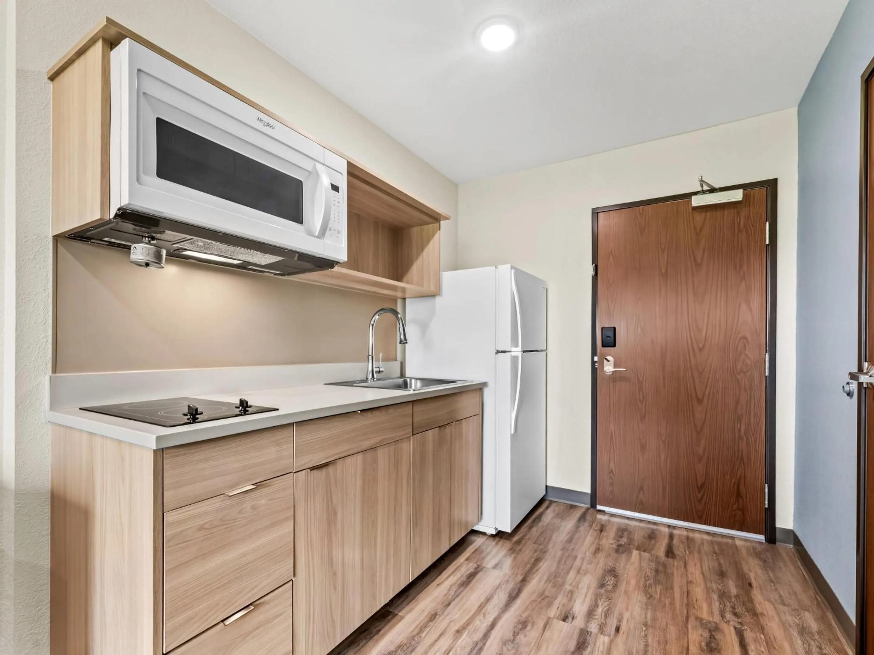 Bedroom in WoodSpring Suites Prattville - Montgomery North