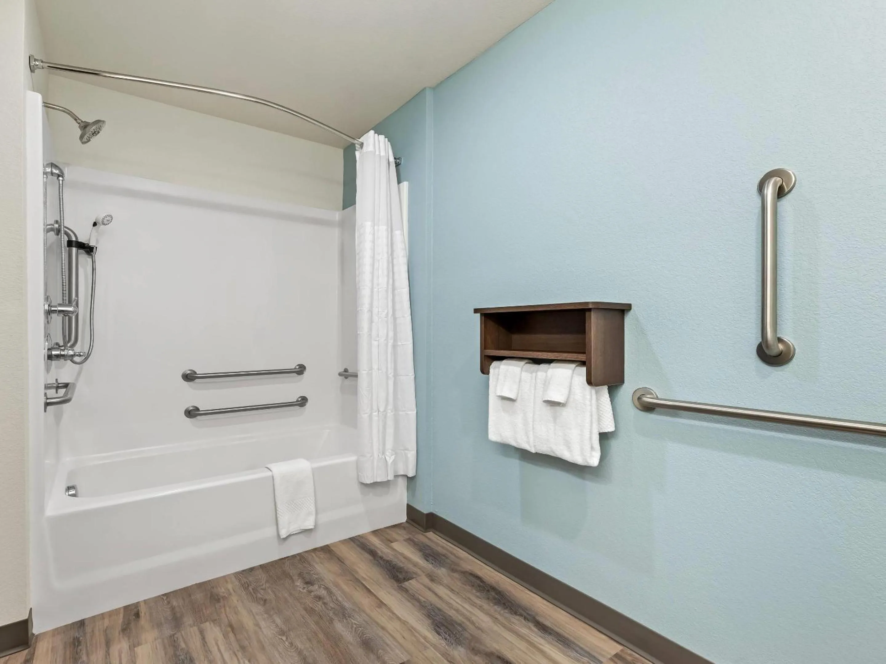 Bedroom in WoodSpring Suites Prattville - Montgomery North