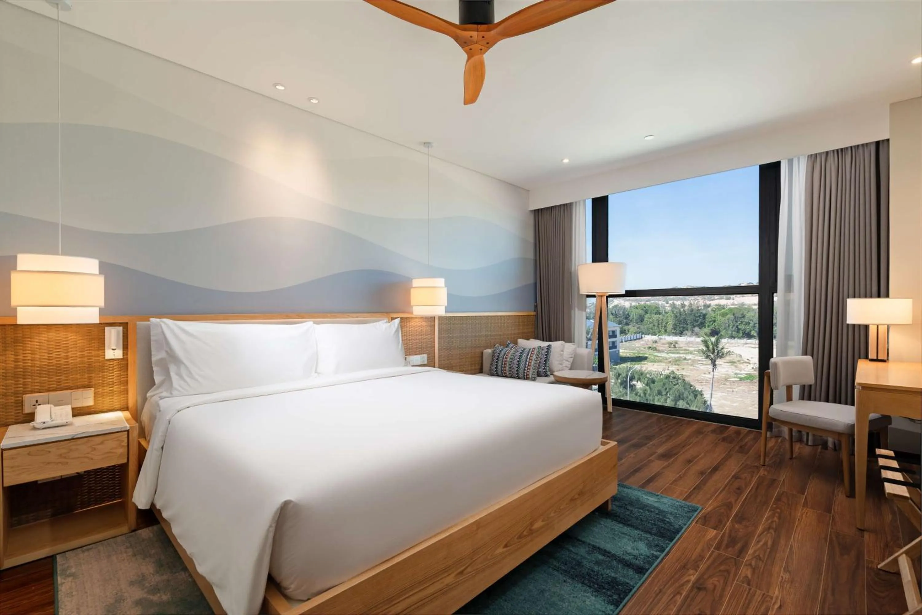 Photo of the whole room, Bed in Radisson Resort Mui Ne