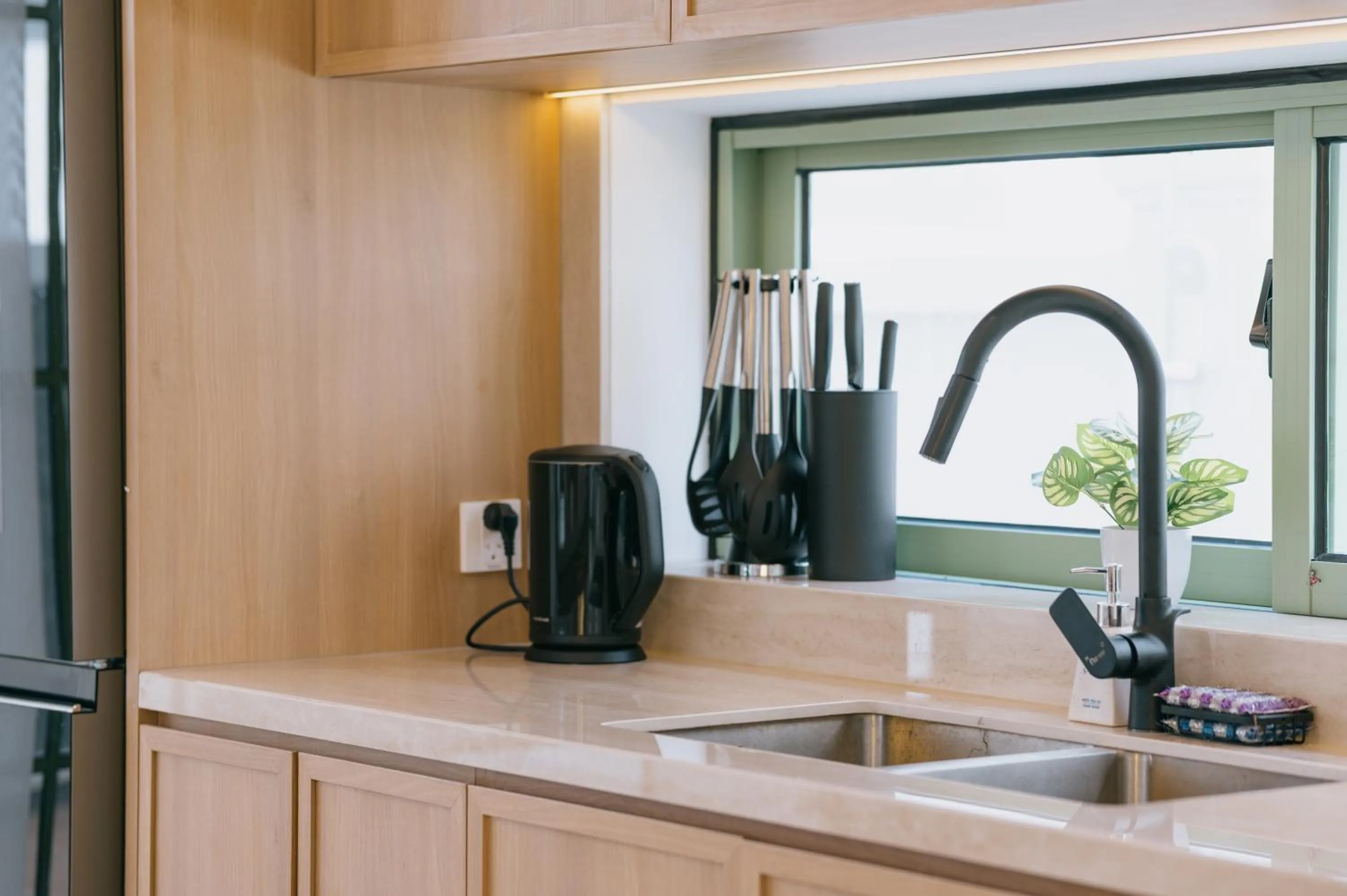 Kitchen or kitchenette in La isla Apartments & Villas - Sea View & Fireworks Phu Quoc