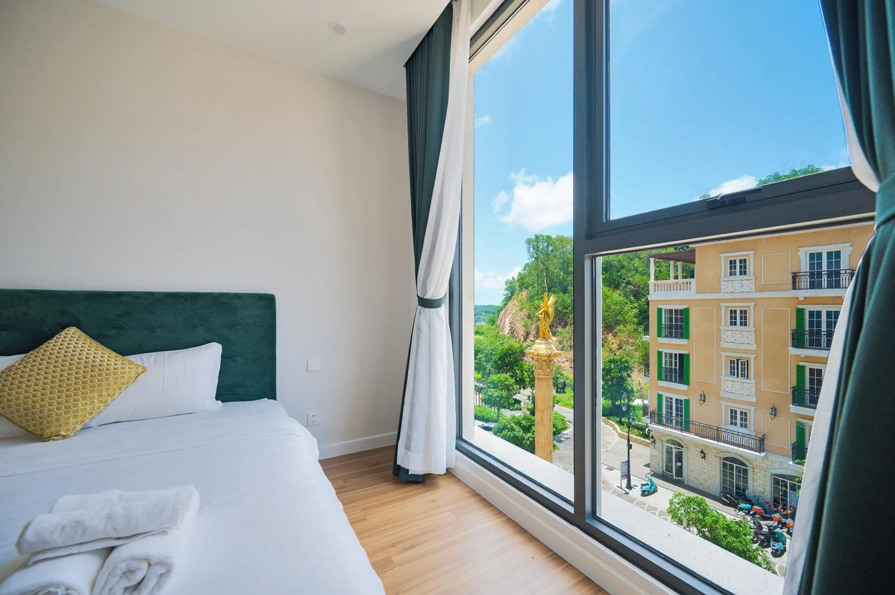 View (from property/room), Bed in La isla Apartments & Villas - Sea View & Fireworks Phu Quoc