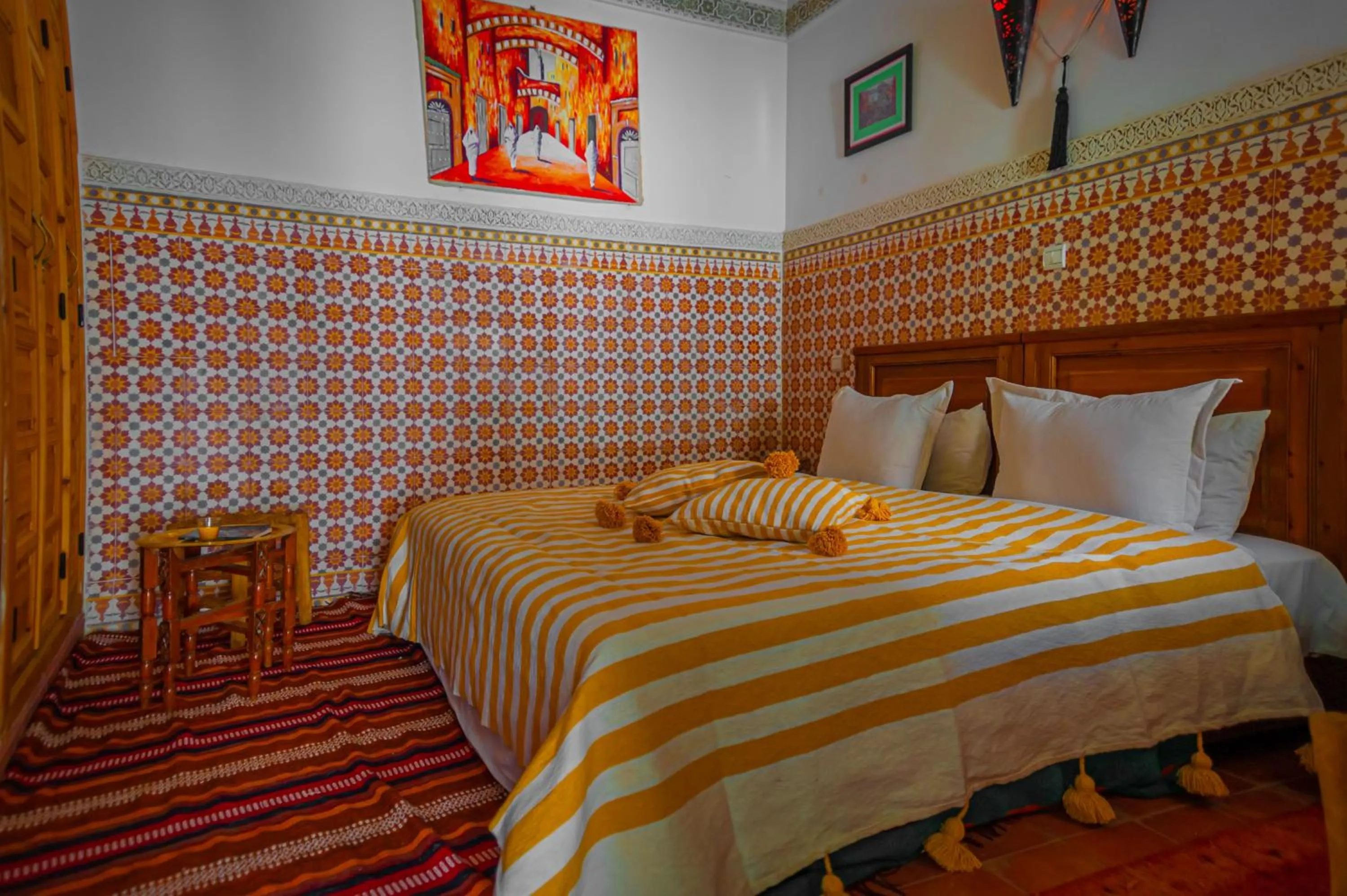 Bed in Riad Dar Mamouni