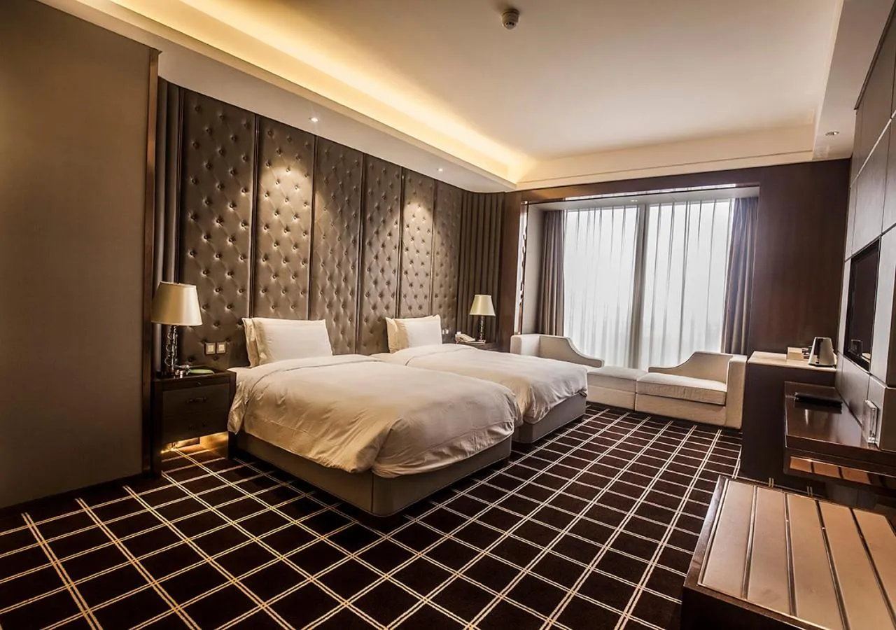 Bed in Royal Century Hotel Shanghai