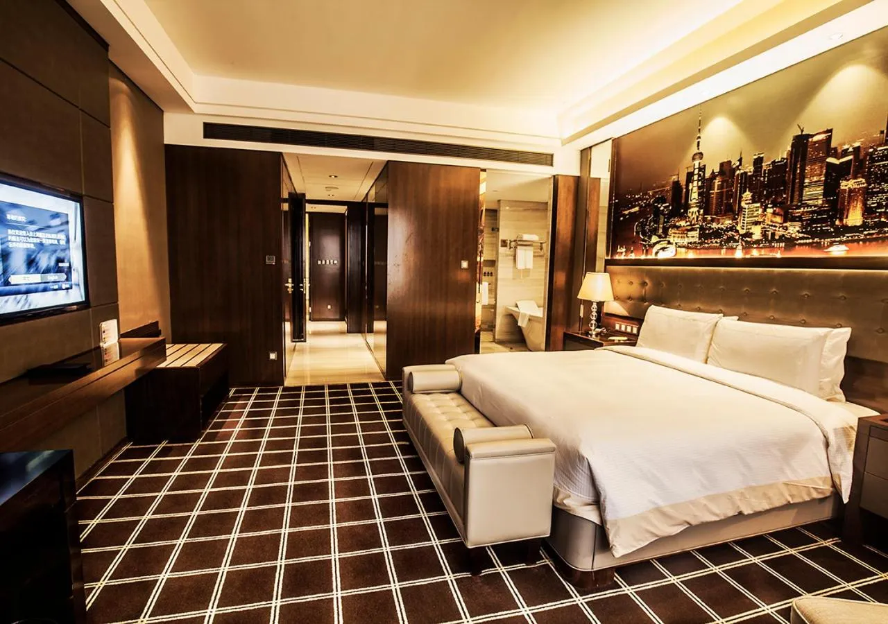 Bed in Royal Century Hotel Shanghai