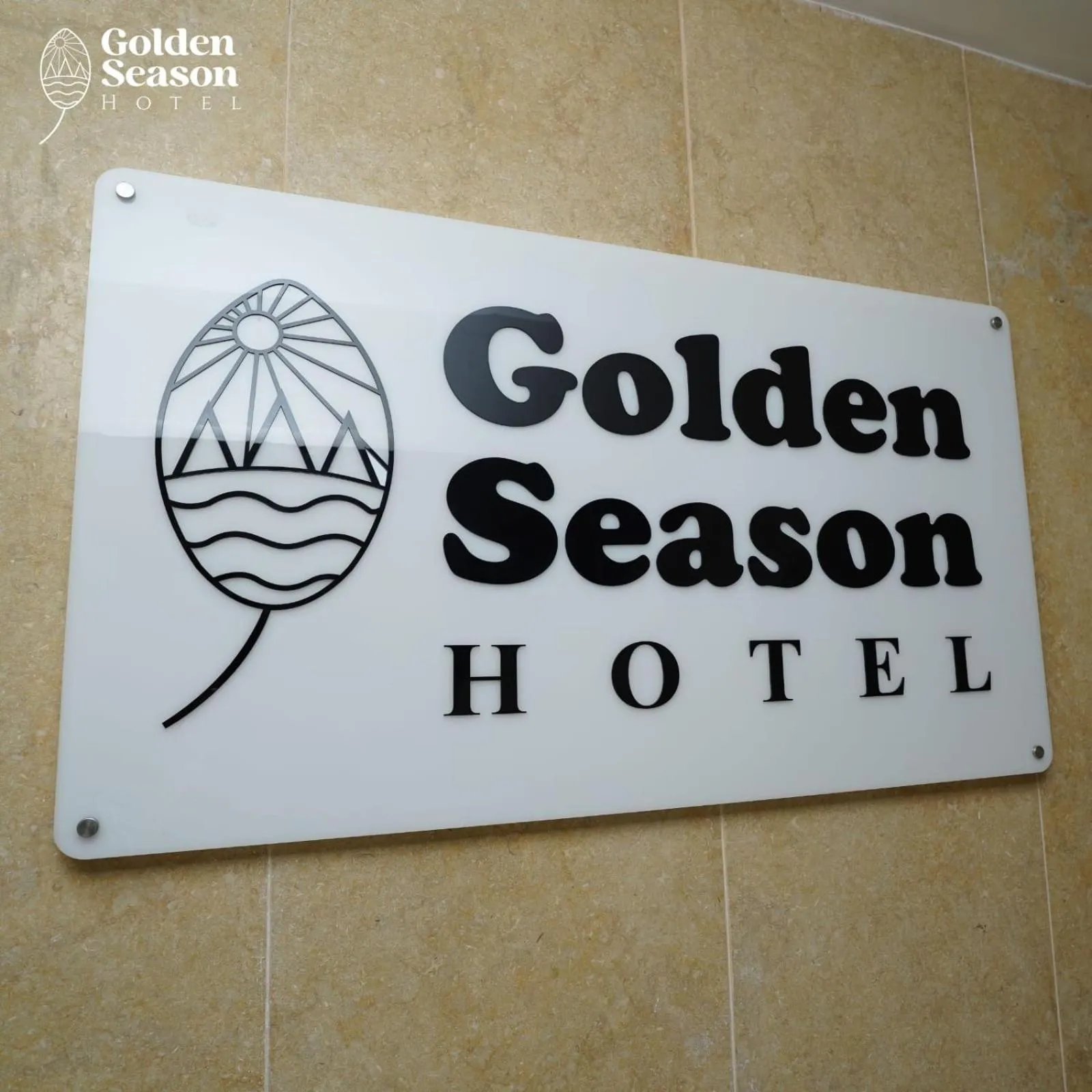 Property logo or sign in Golden Season Hotel
