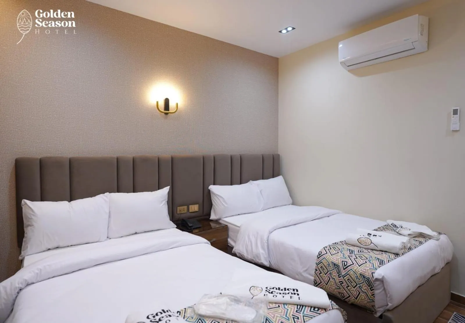 Bed in Golden Season Hotel