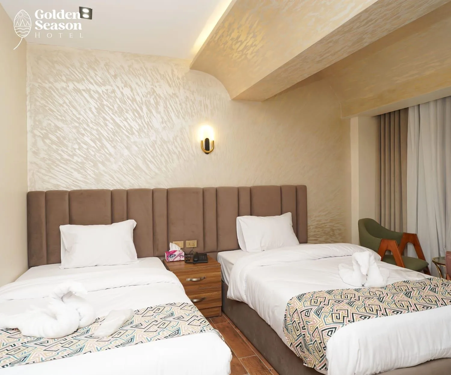 Bed in Golden Season Hotel