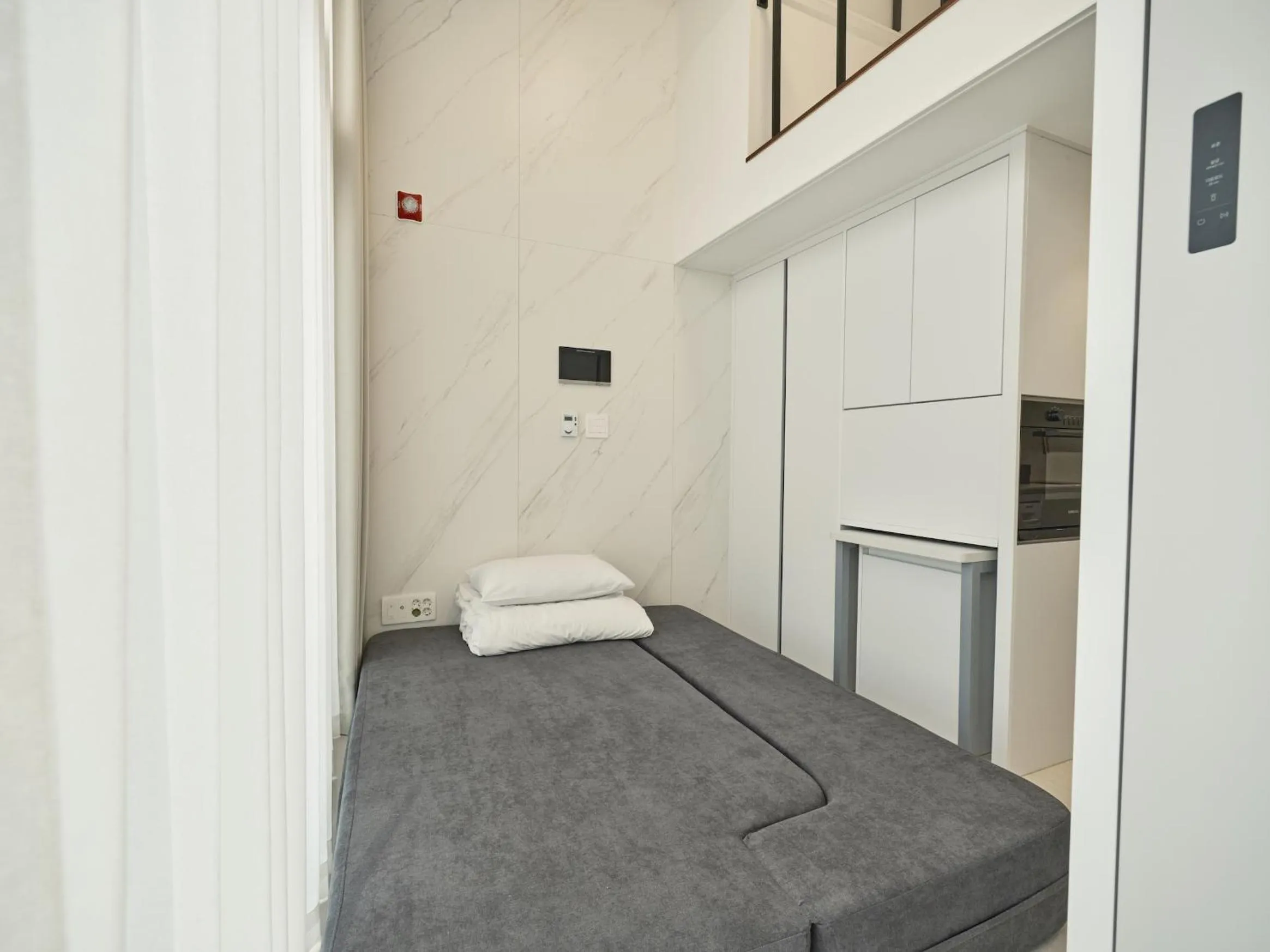 Living room, Bed in UH FLAT Signature GANGNAM