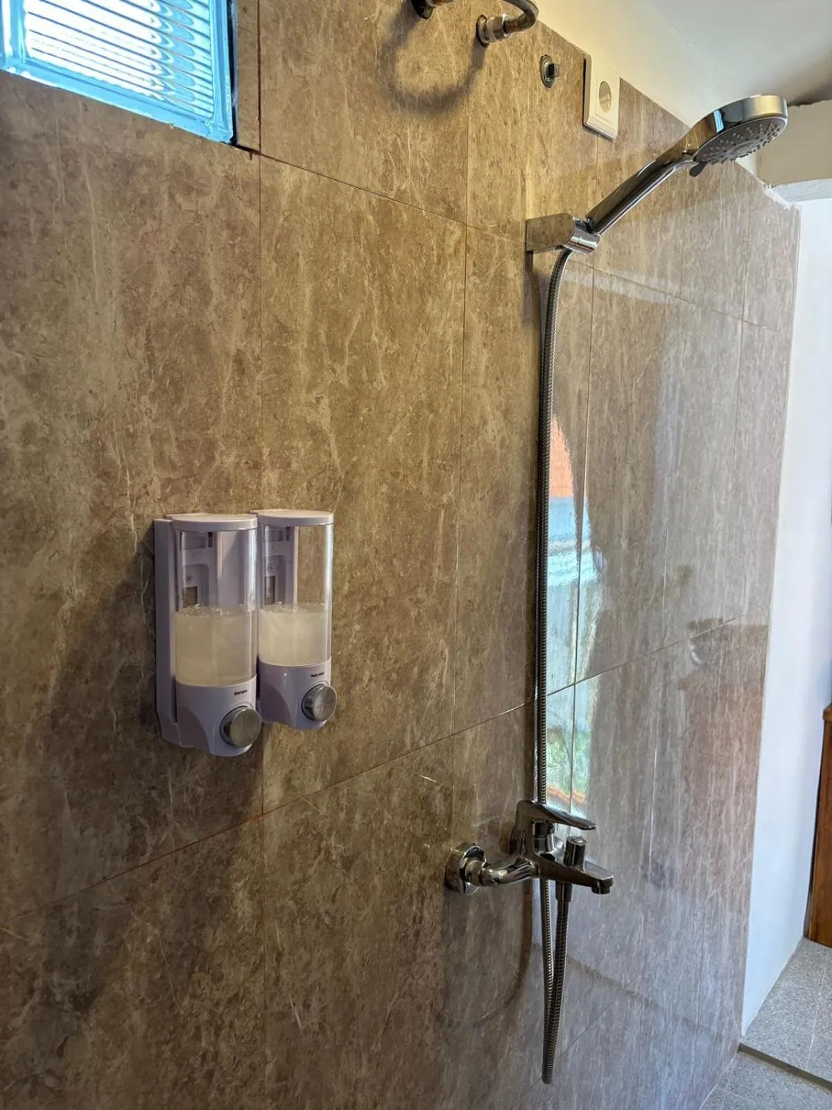 Shower in Alit Guest House