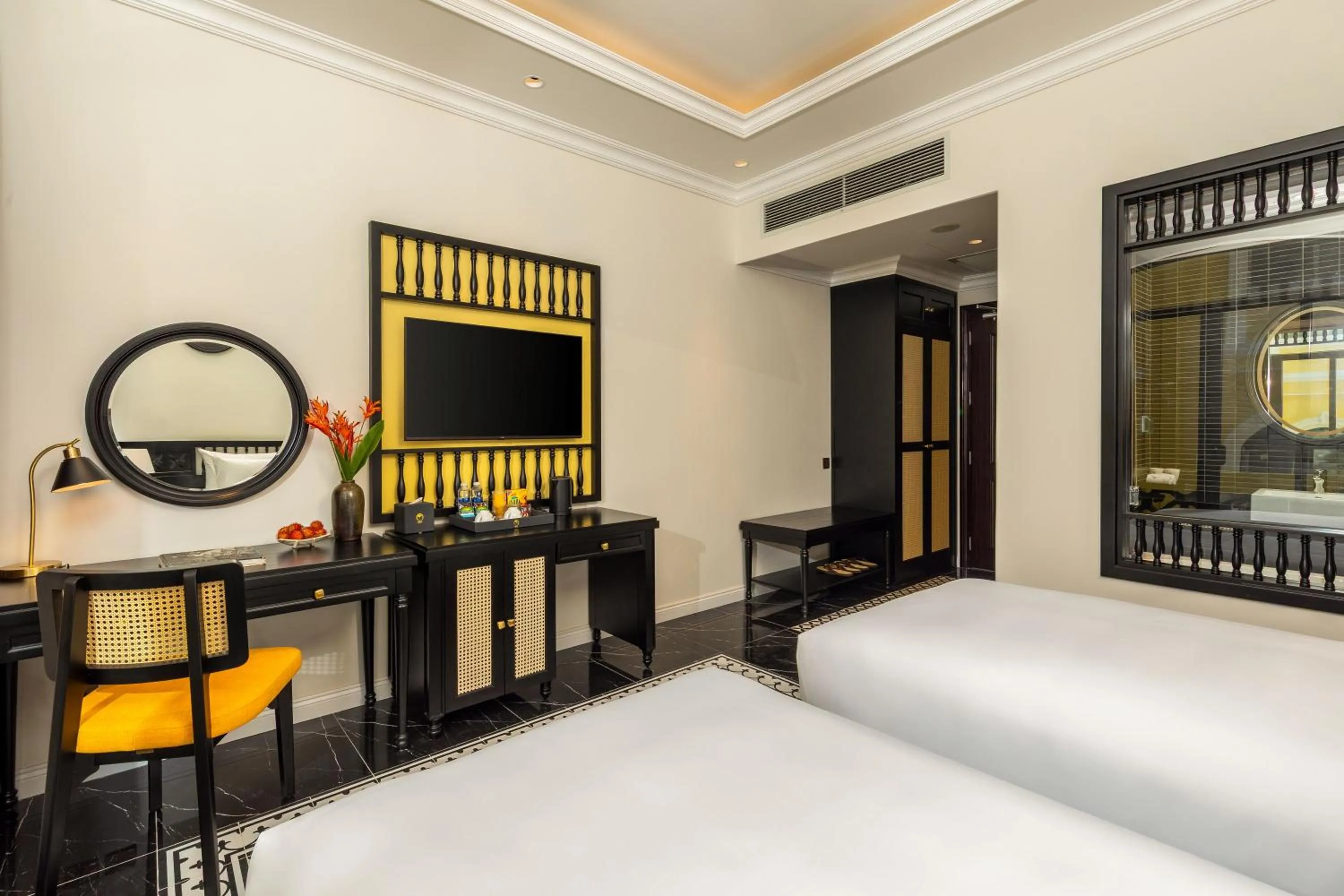 Bed in Nesta Hoian Resort & Spa