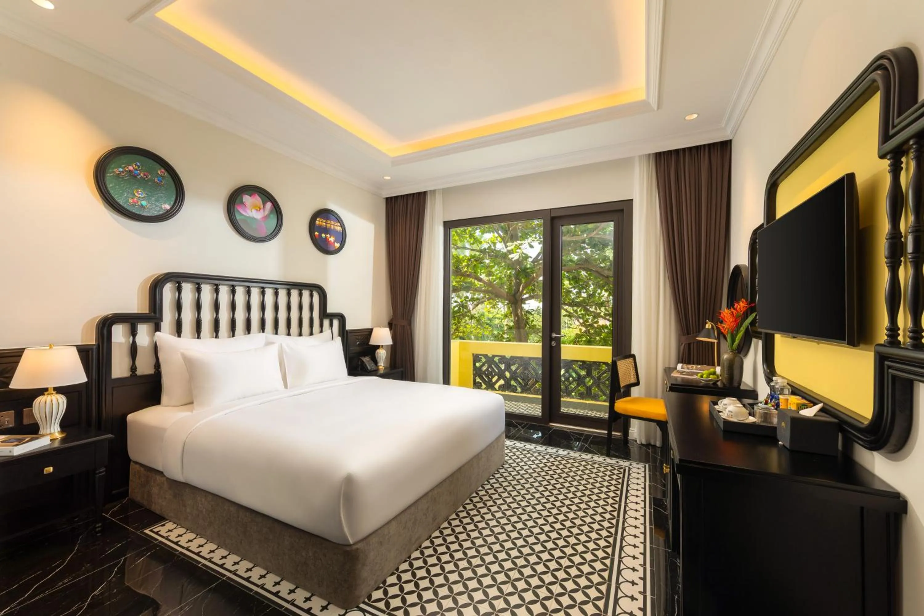 Bed in Nesta Hoian Resort & Spa