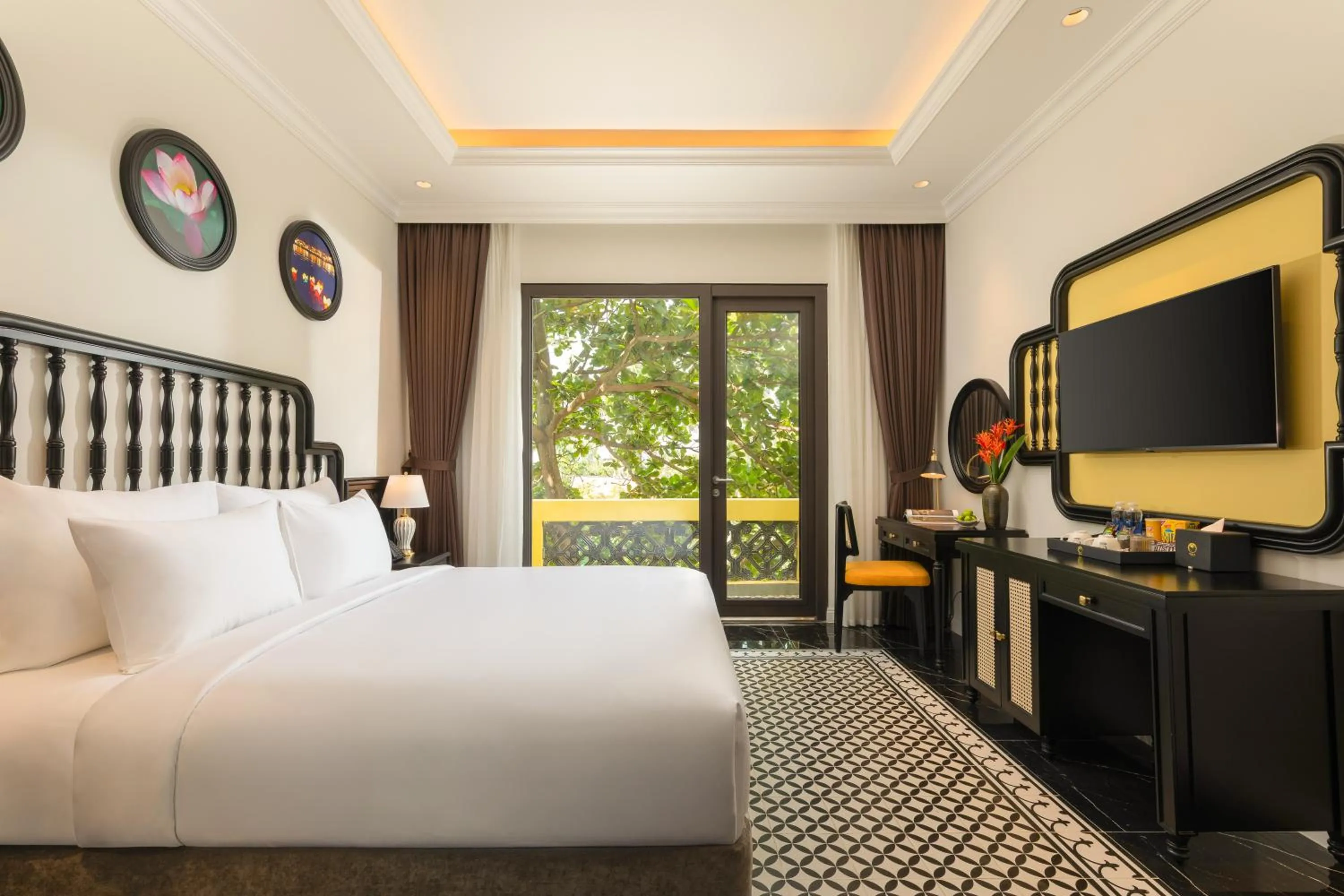 Bed in Nesta Hoian Resort & Spa
