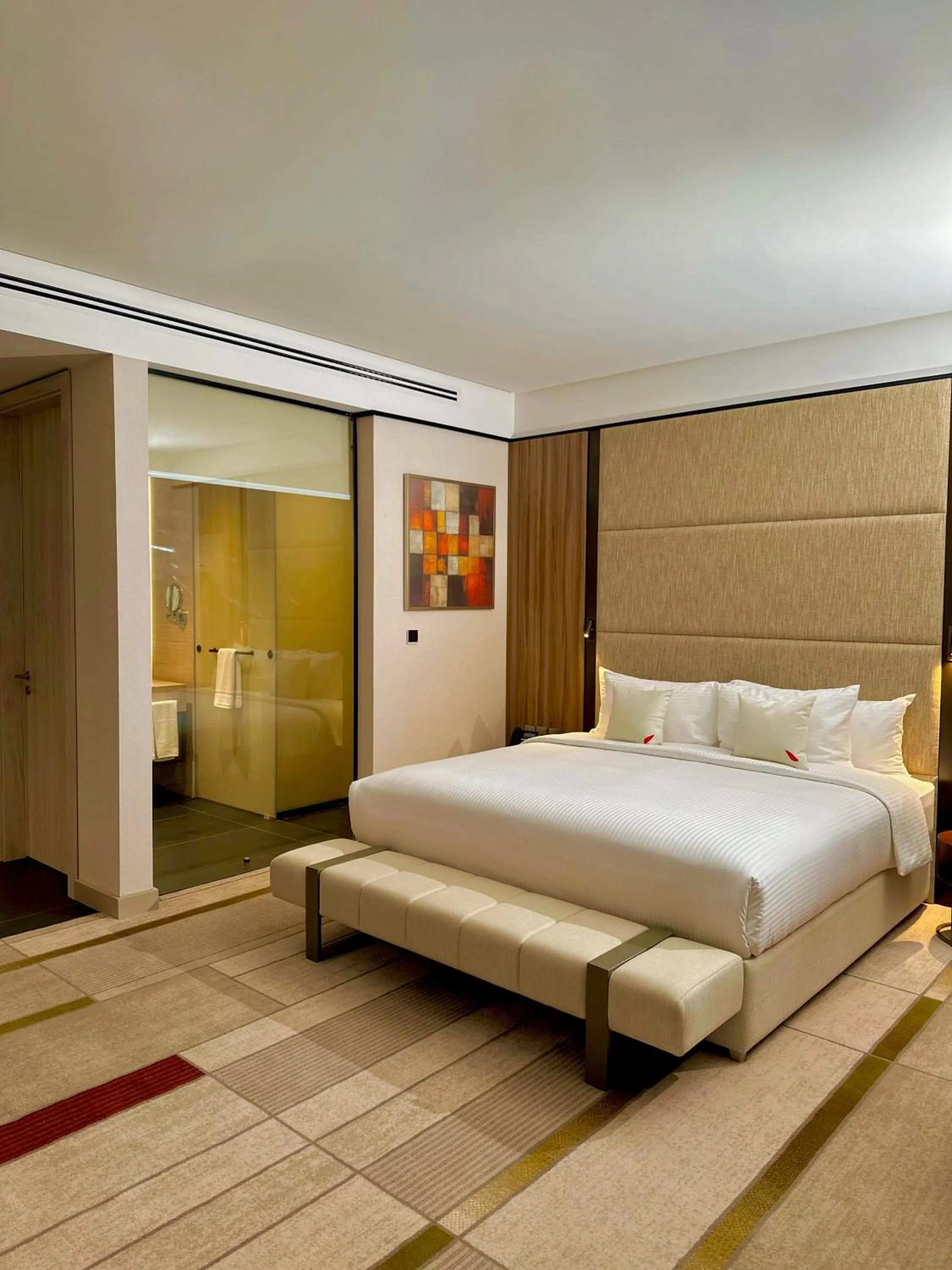 Bed in Swisstouches Hotel Amman