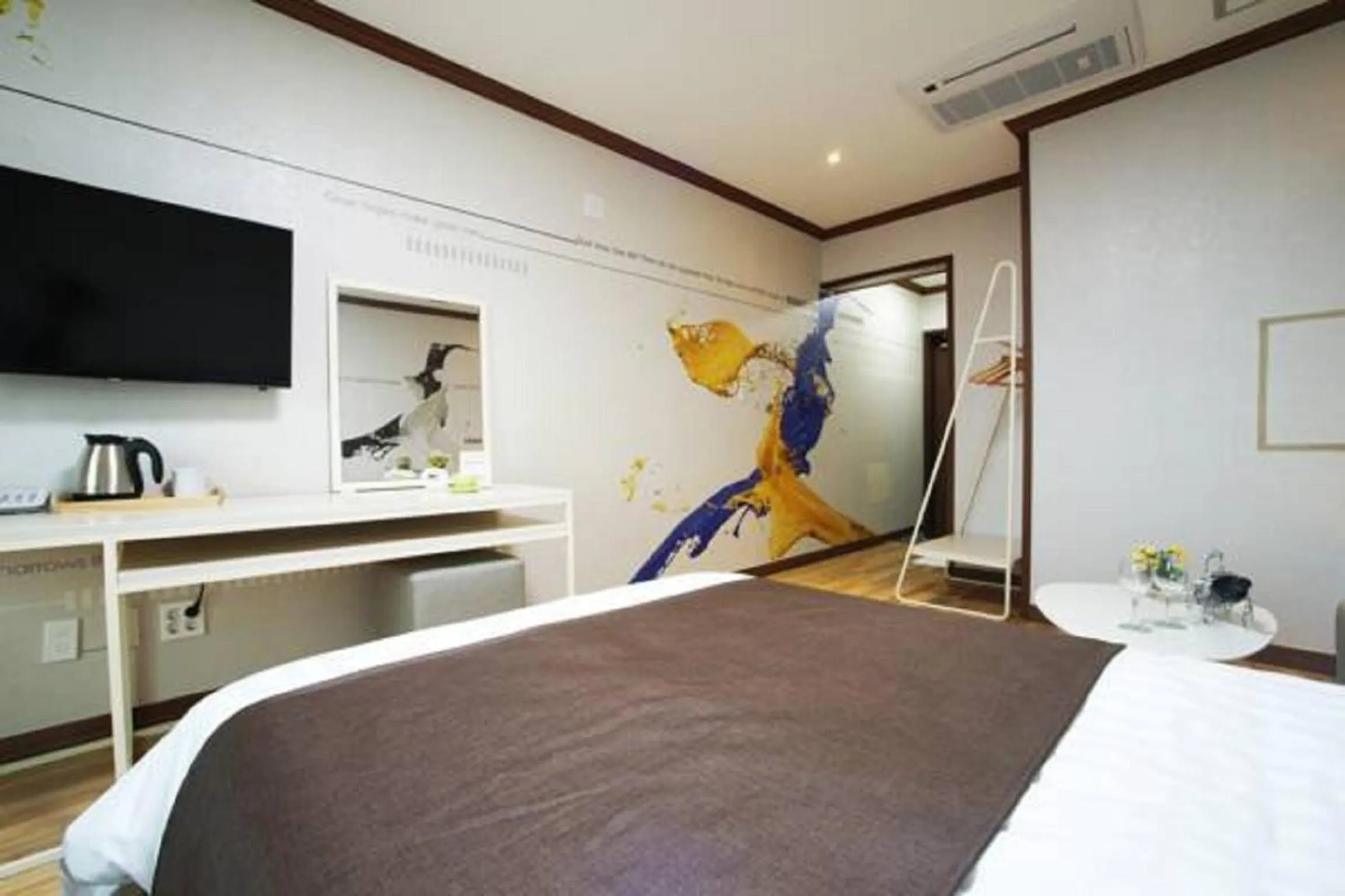 Bed in Seongsan Aqua Beach Hotel