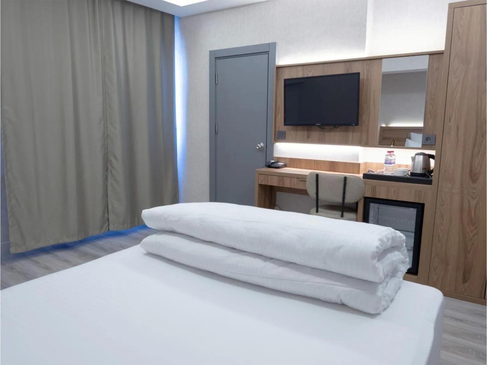 Bed in Optimal Hotel