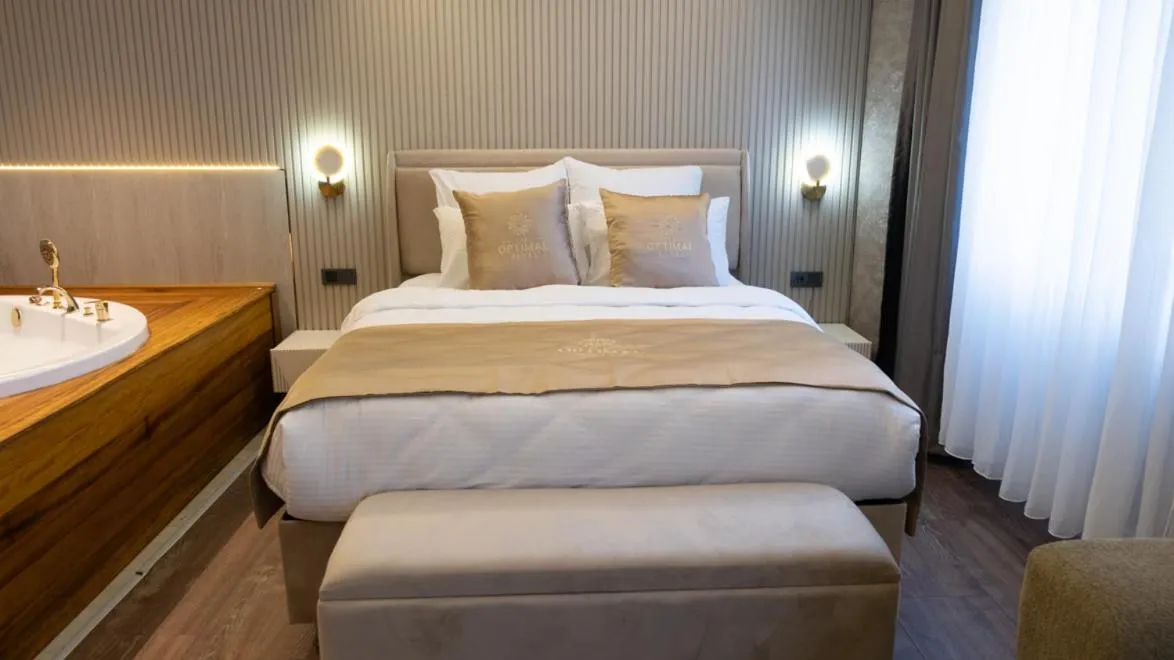 Bed in Optimal Hotel